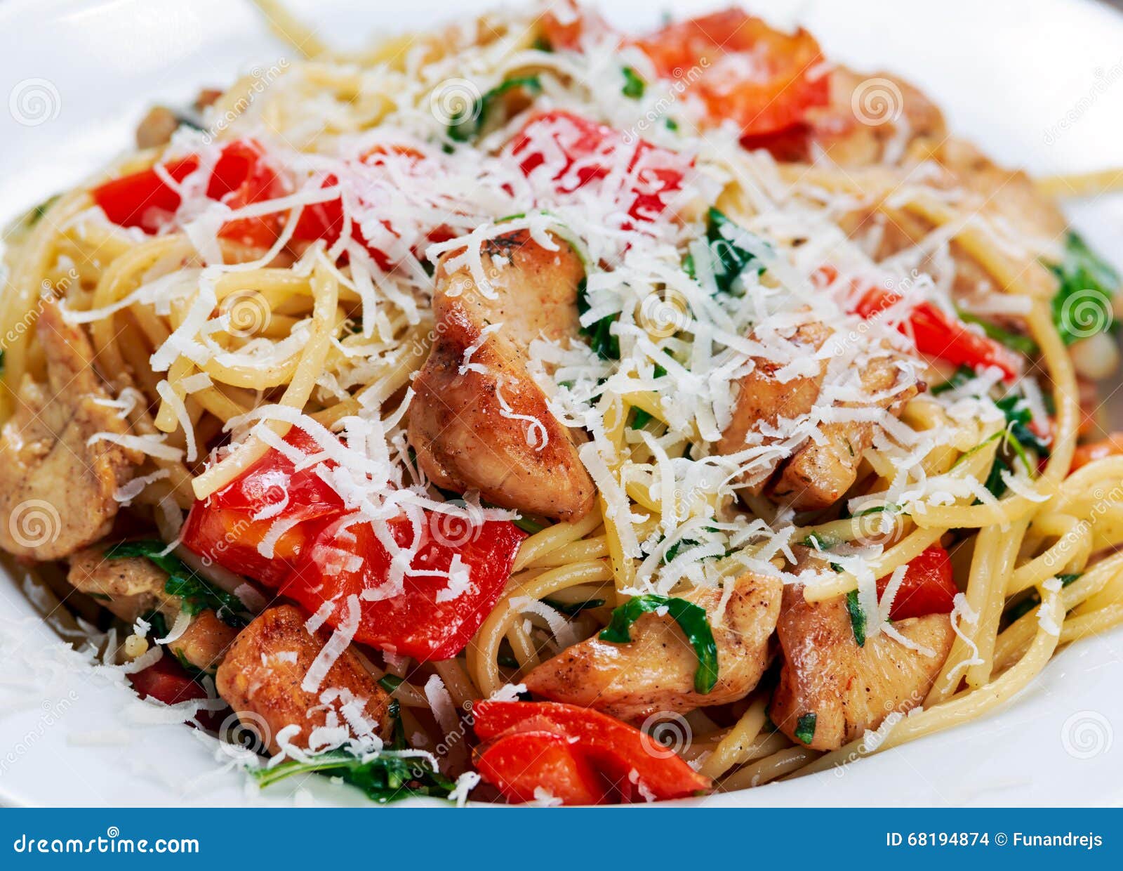 Close Up Italian Chicken Breast Pasta Spaghetti with Red Pepper