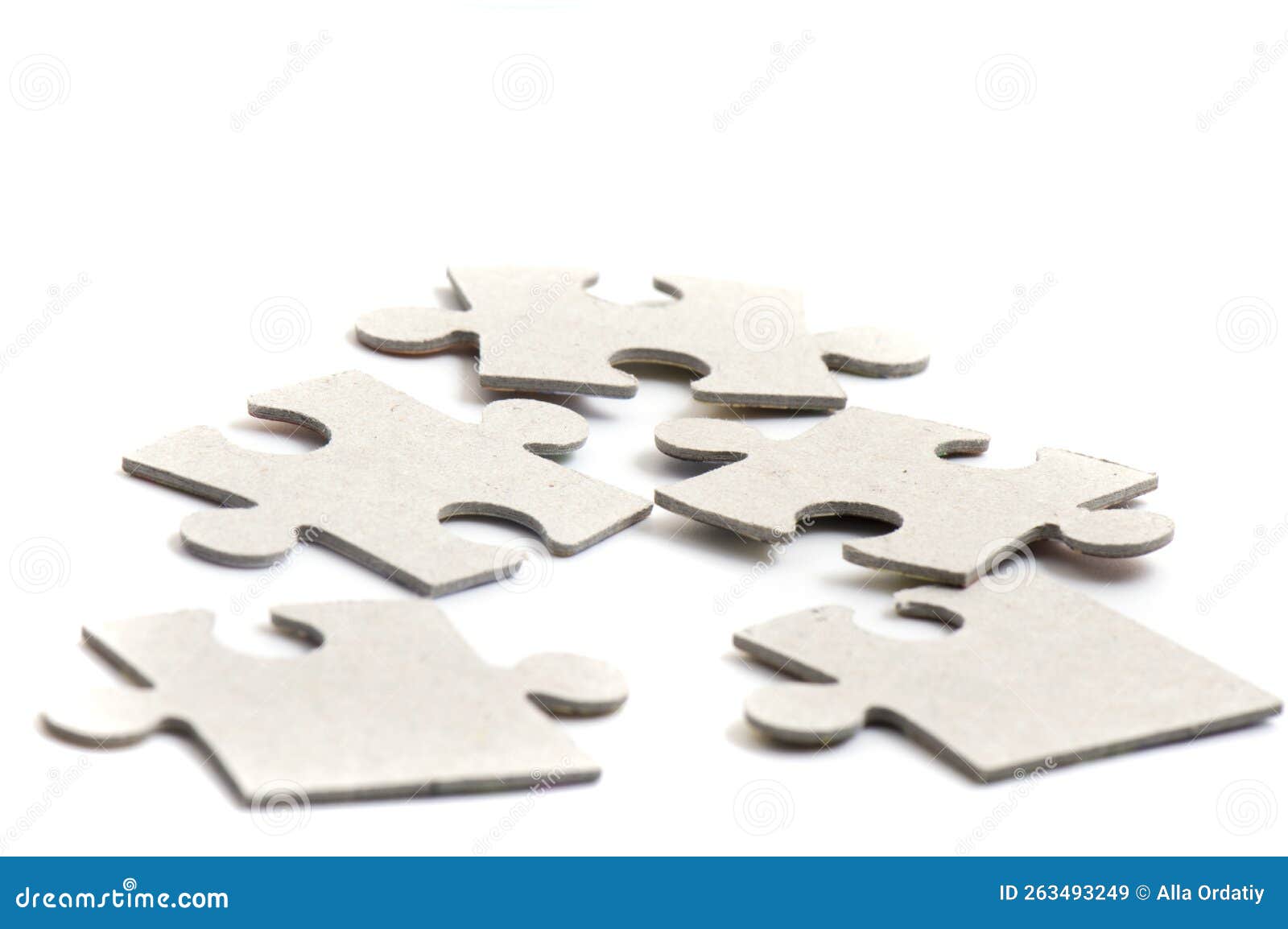 Closeup on Jigsaw Puzzle Pieces, Blank White Paper Jigsaw Puzzle Elements Linked Together and