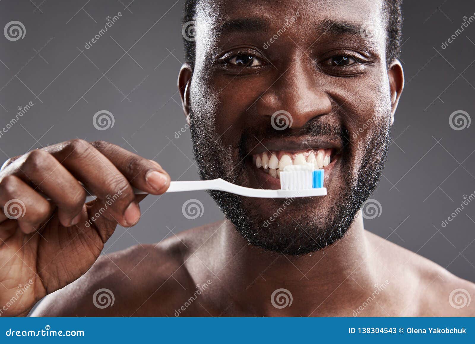 Close Up of a Joyful Afro American Man Brushing His Teeth Stock Image ...