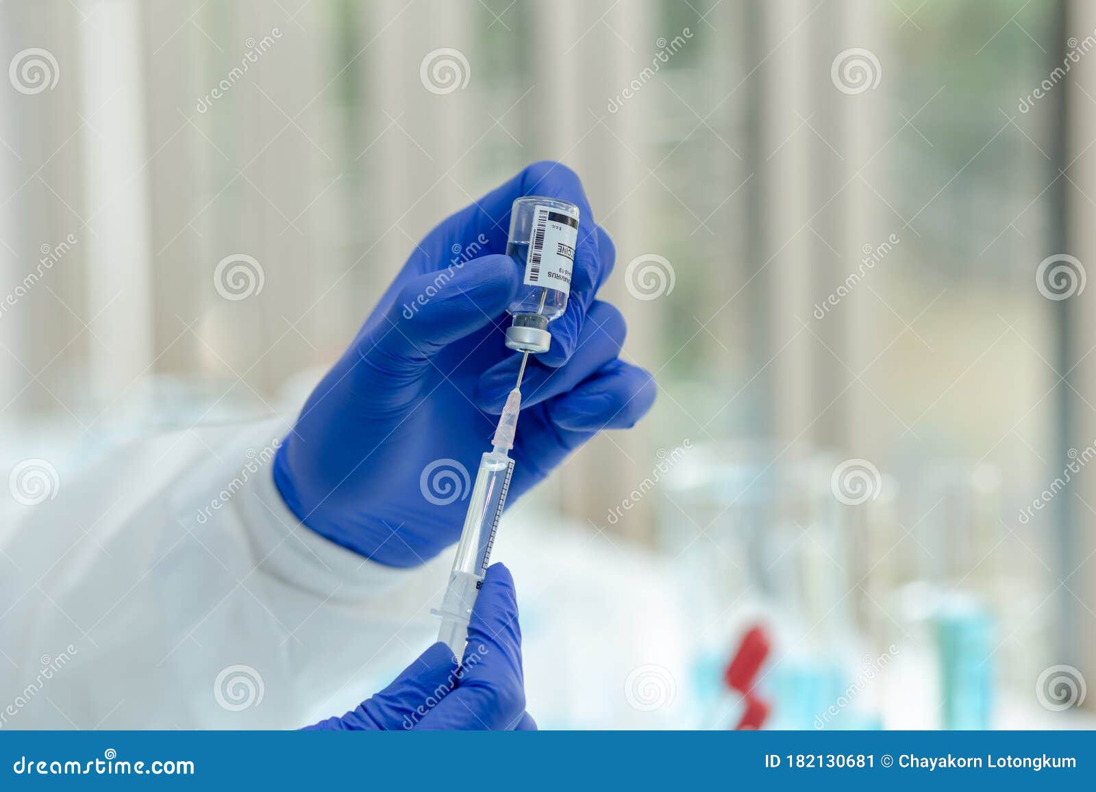 close-up on laboratory tube virus corona covid 19 vaccine.