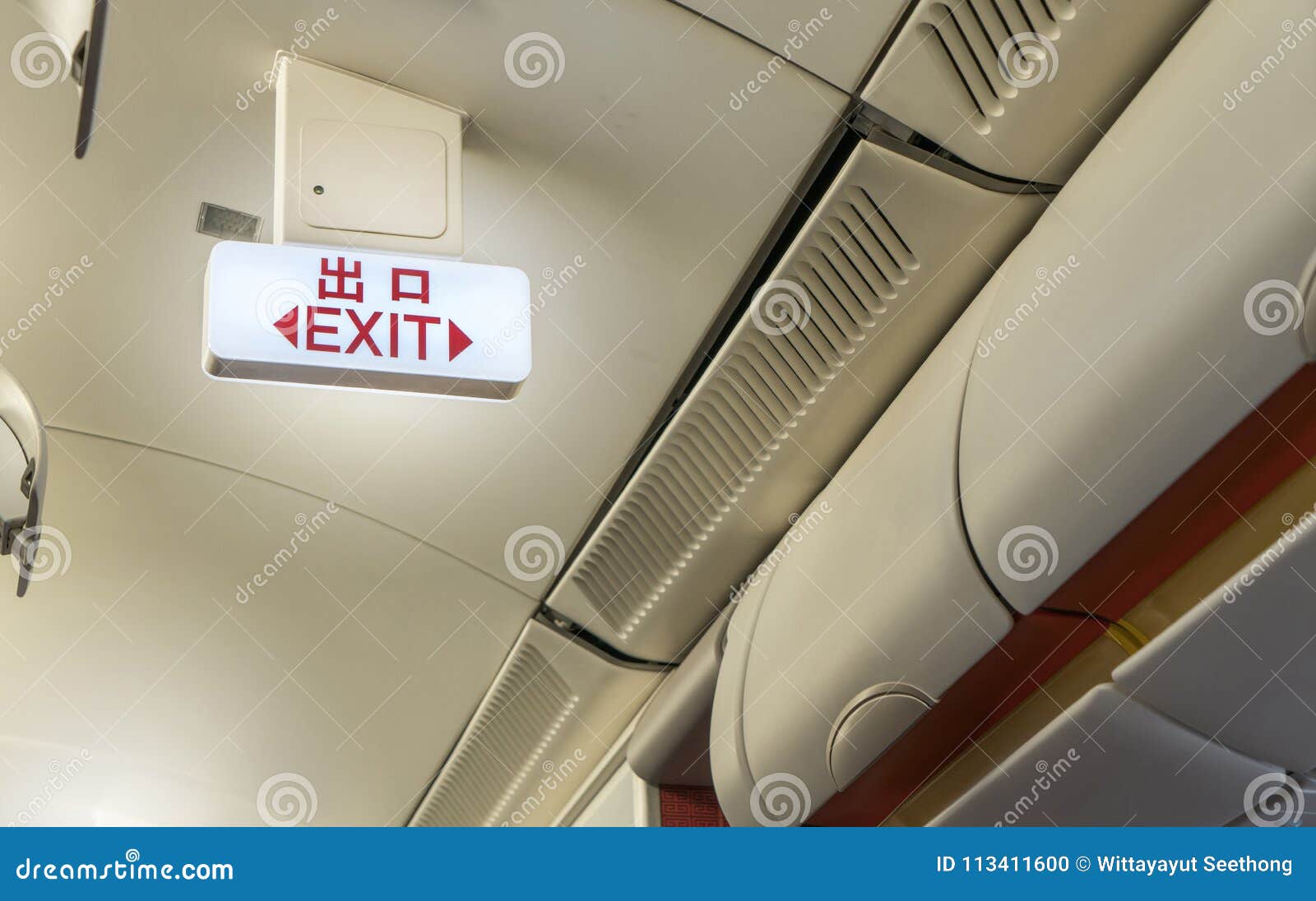 Close Up Of Light Board Emergency Exit Way Sign On Airplane For Safety And Security Services