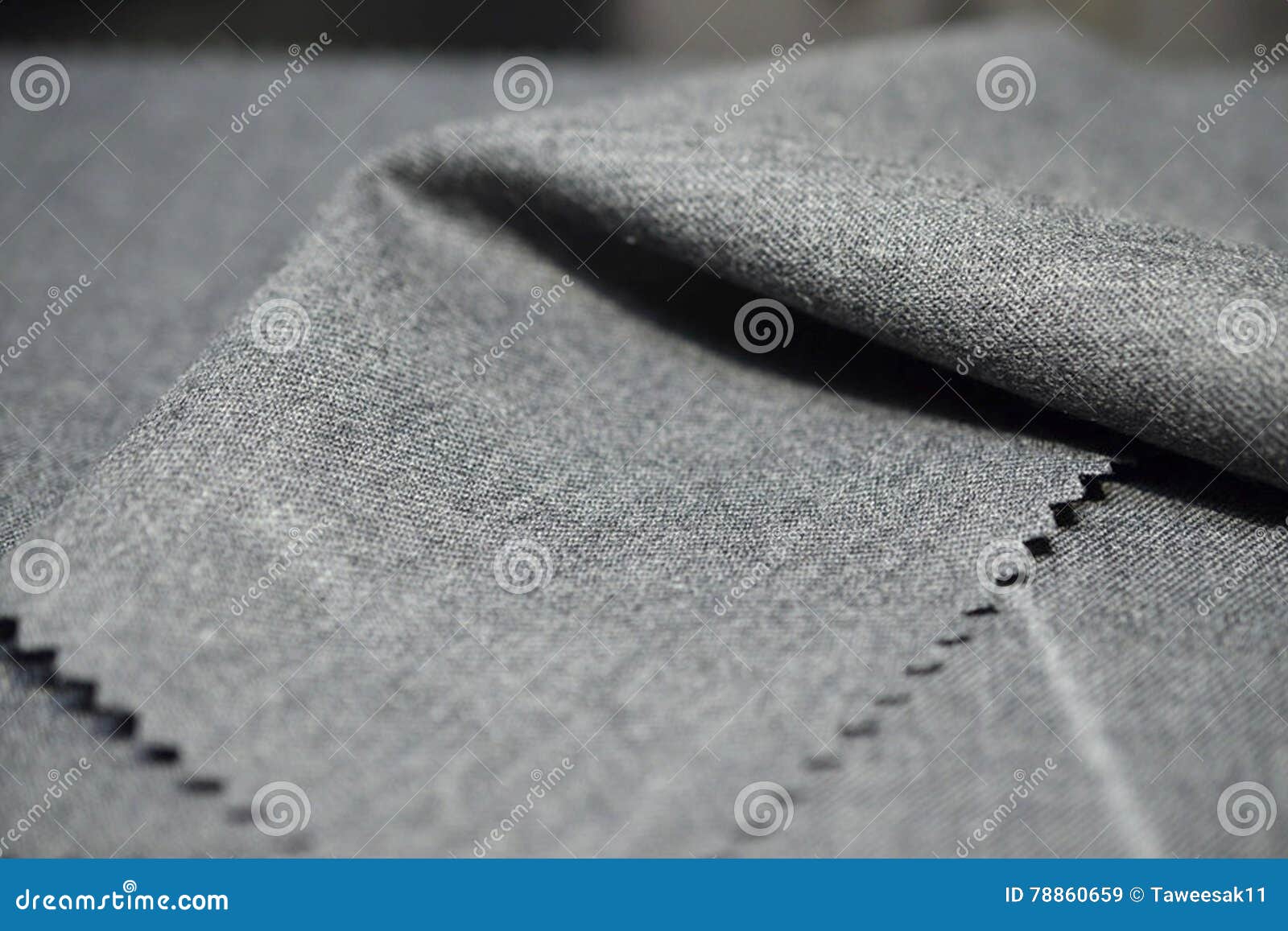 Close up light gray fabric of suit, photo shoot by depth of field for object