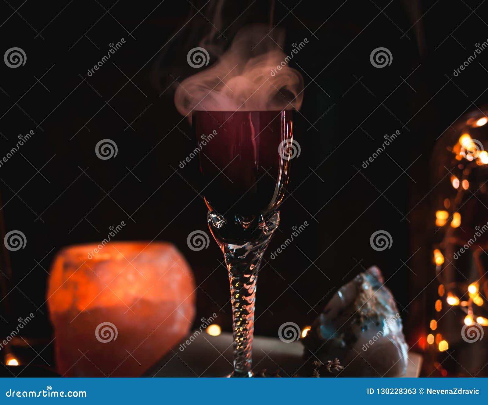 close-up of magic potion in a glass. magic and wizardry concept