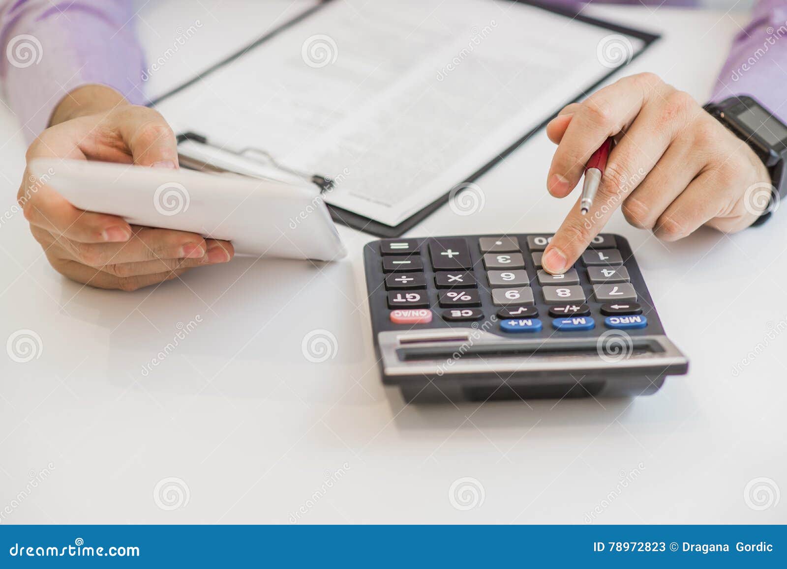 close up of male accountant or banker making calculations. savings, finances and economy concept