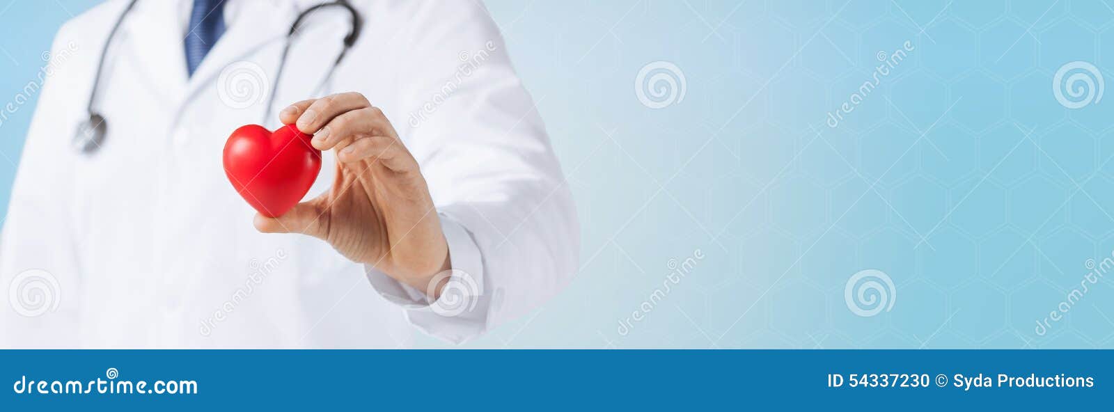 close up of male doctor hand holding red heart