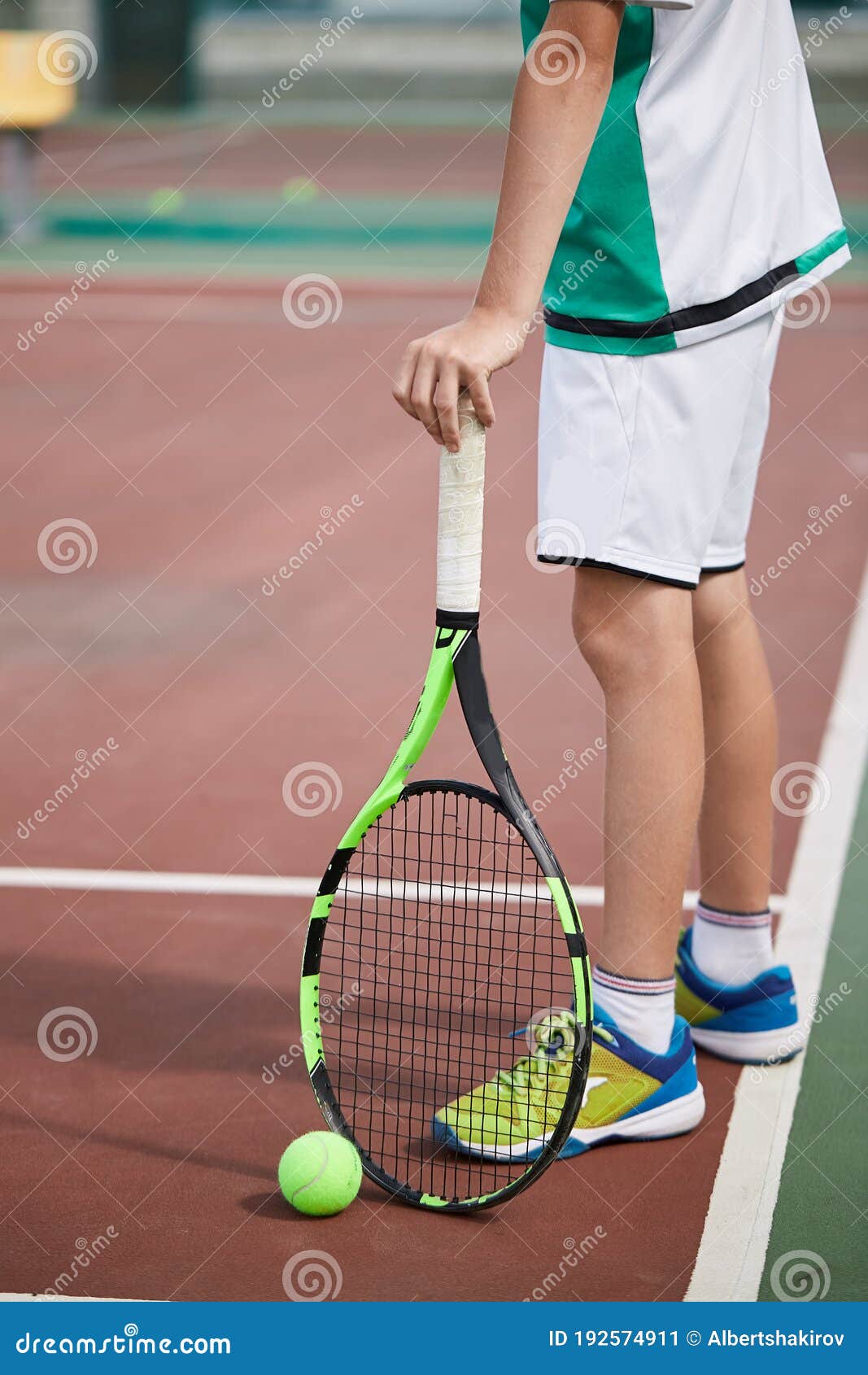 Close Up Of Male Hand Holding Tennis Ball And Racket On Red Clay Court Stock Image Image Of Leisure Champion