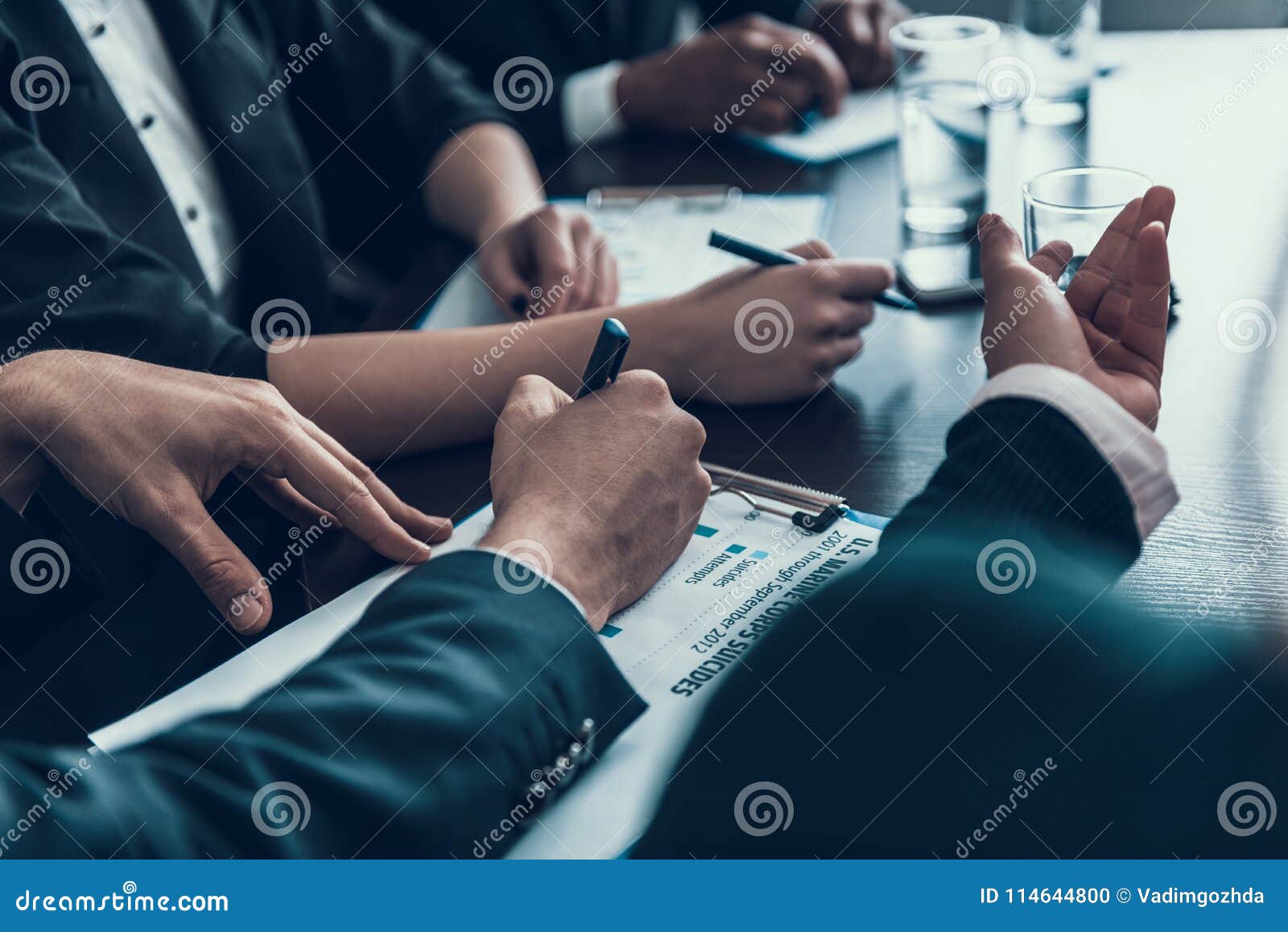 Close Up. Male Hands Write By Pen On Paper. Business Meeting