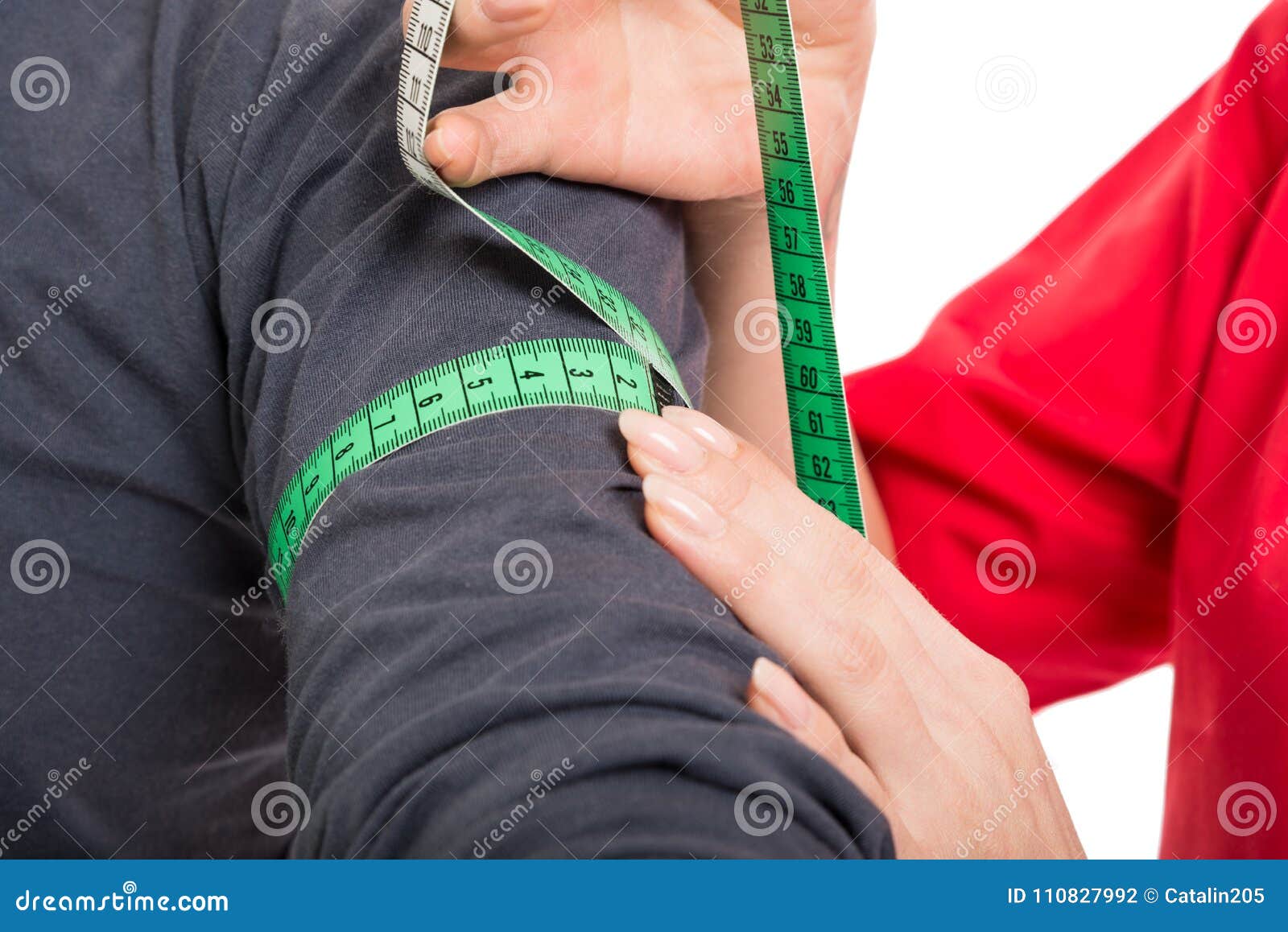 Close Up Of Male Patient Being Measured By Female Doctor Stock Photo