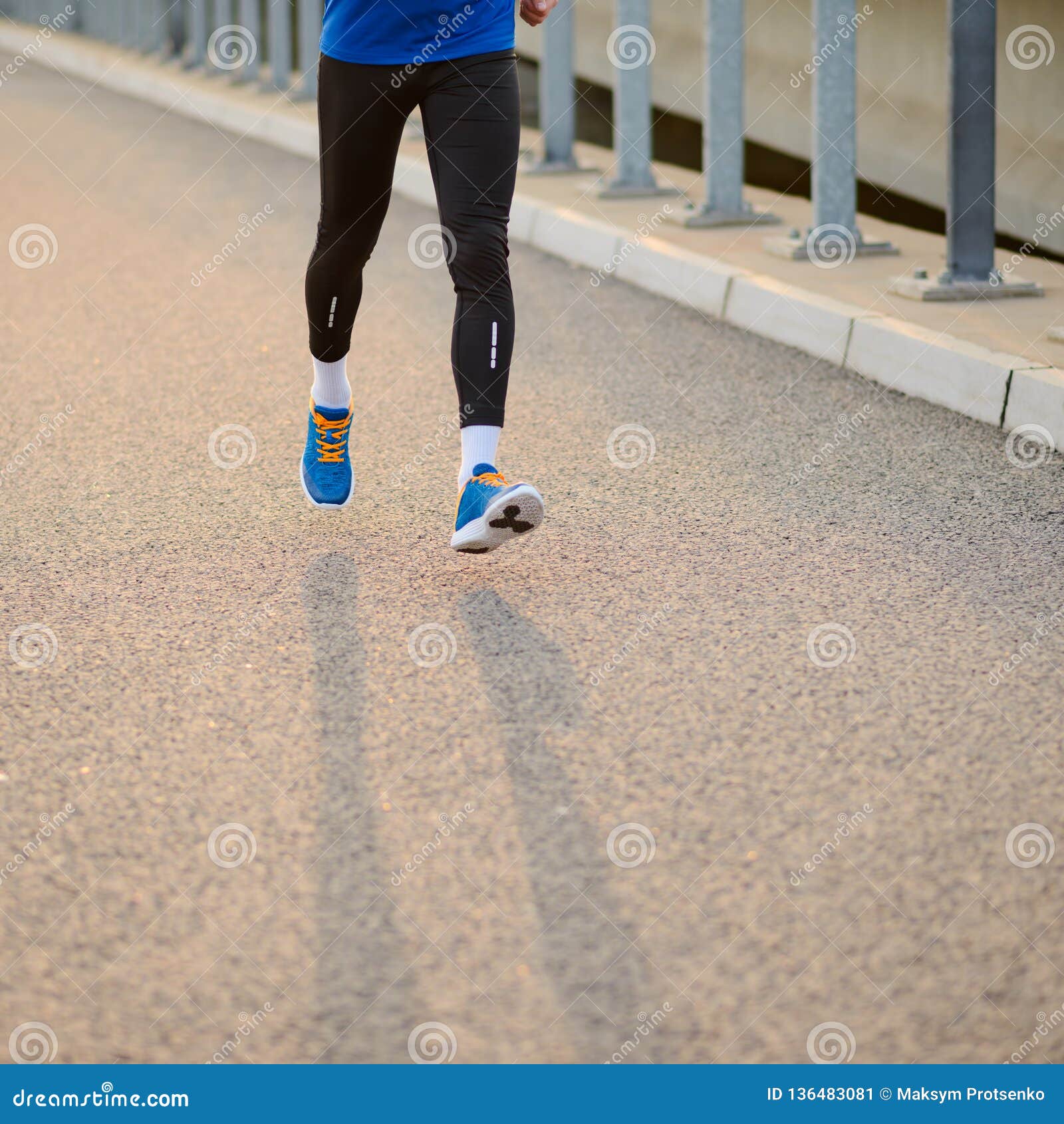 Close Up Of Male Sports Mans Legs Running At Sunset Healthy Lifestyle And Sport Concept Stock