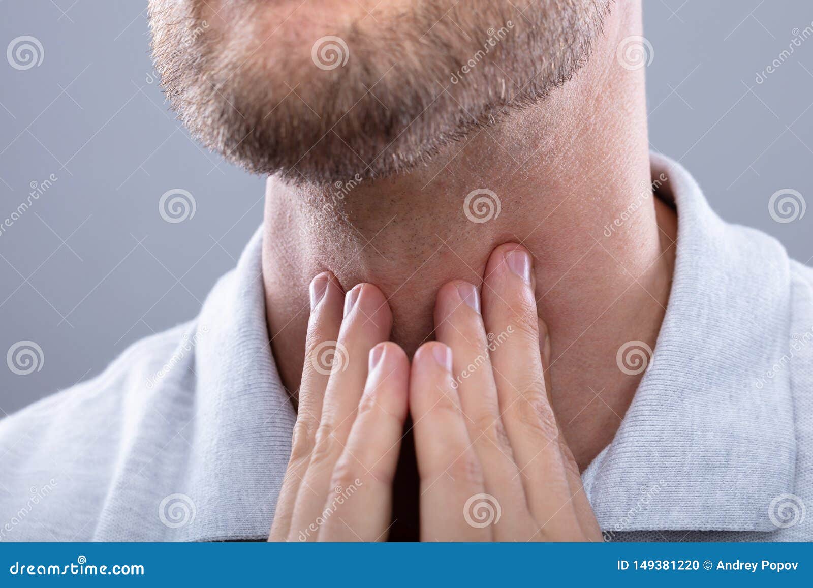 man having sore throat