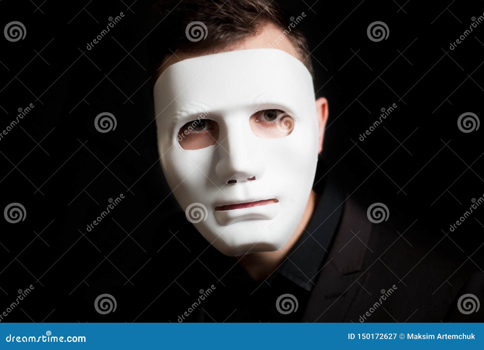 Close-up of a Man in a White Mask on a Black Background Stock Image ...