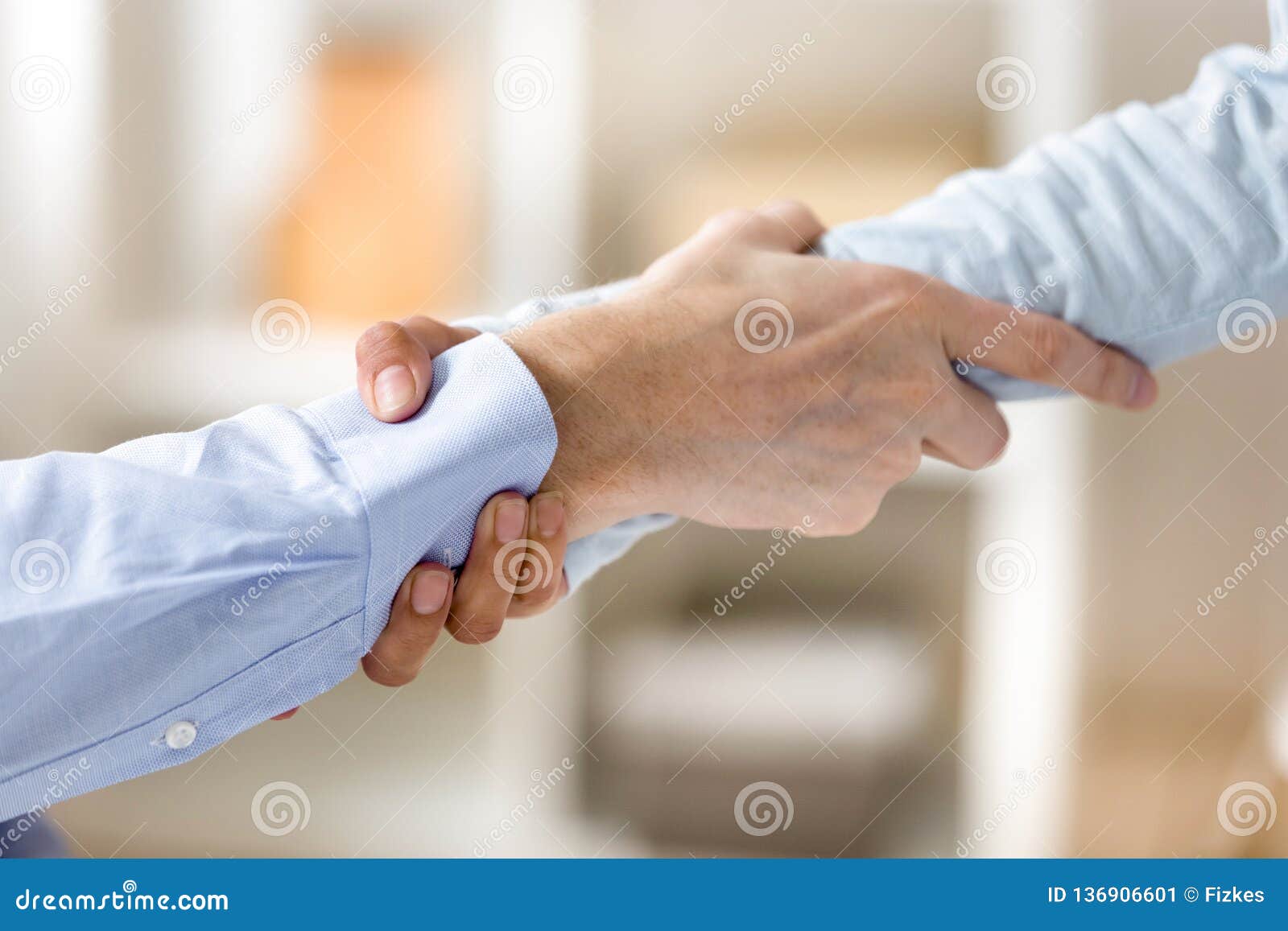 close up man and woman holding each other wrists, support concep