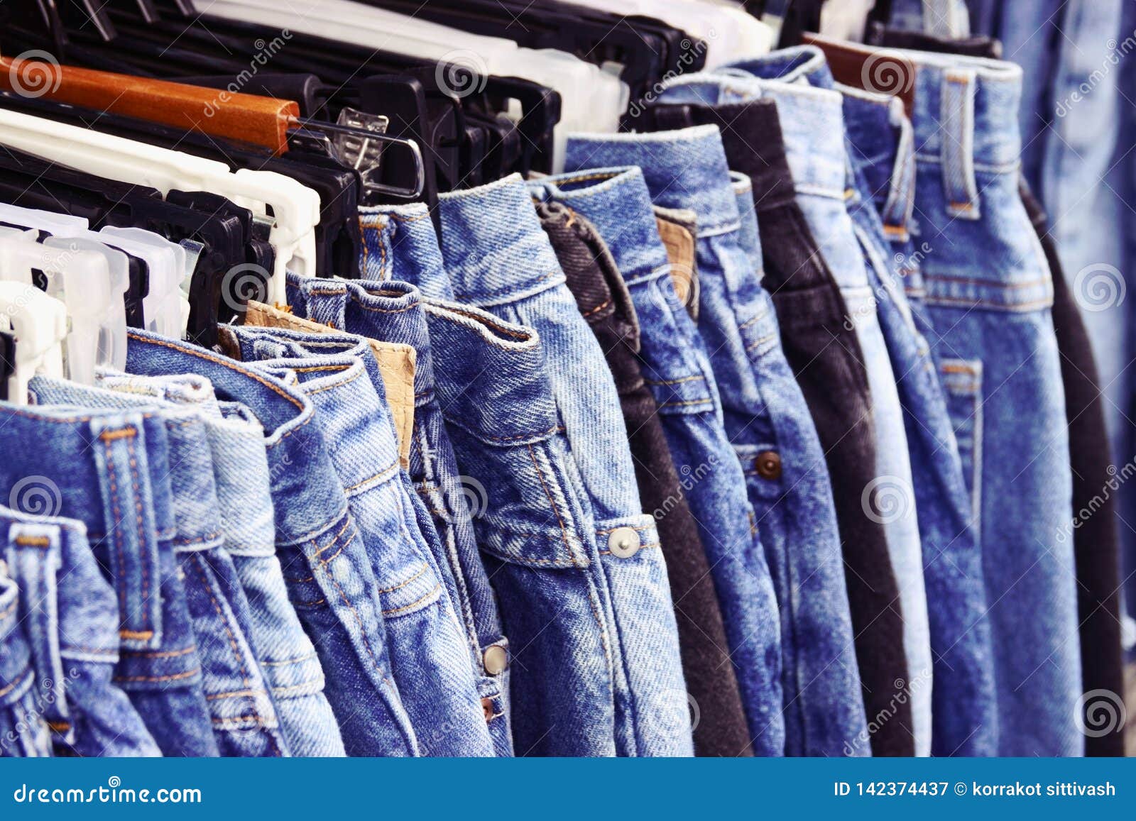 Close Up Many Jeans Hanging on Rack Stock Image Image of color, hang