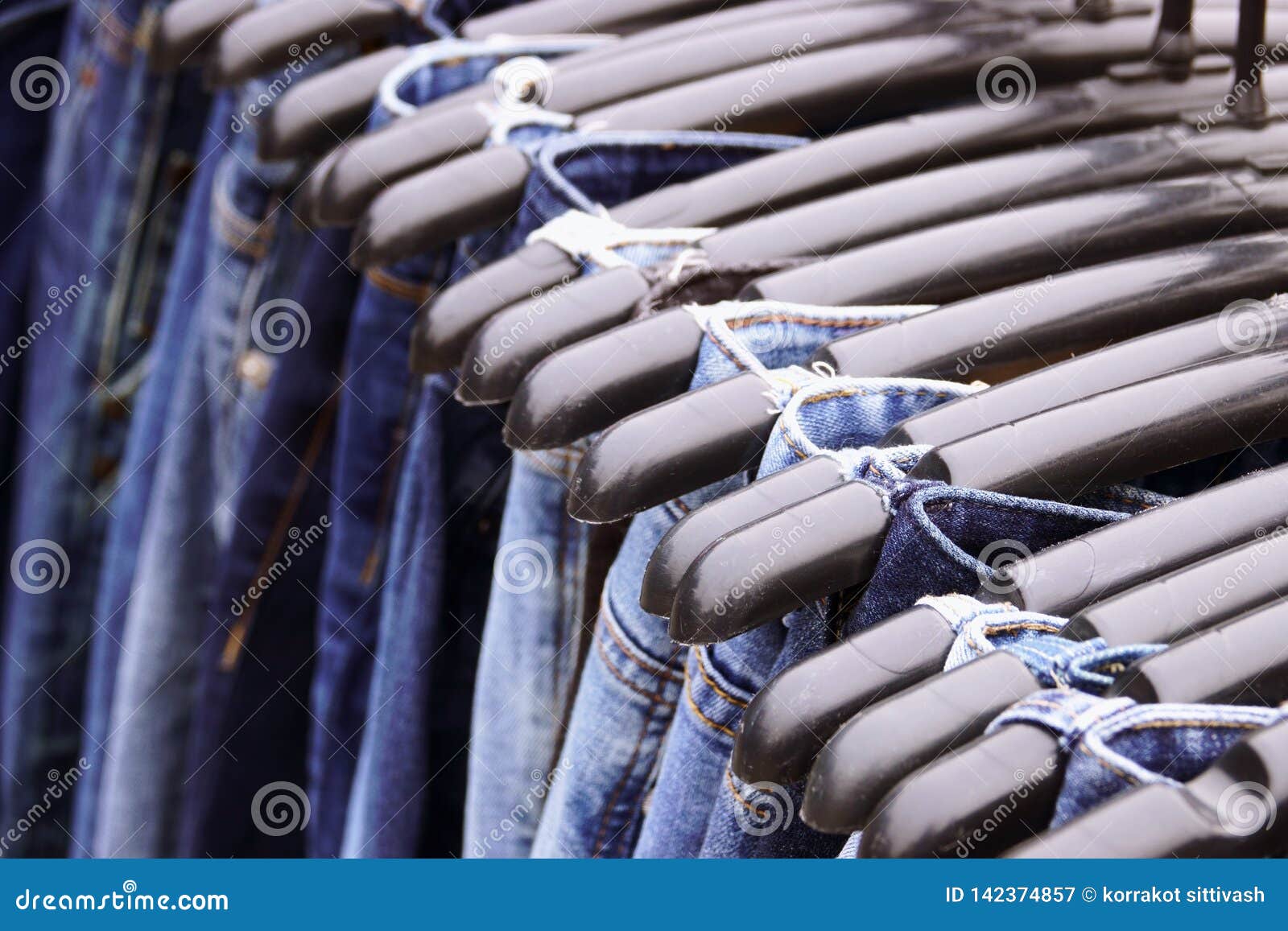 Close Up Many Jeans Hanging on Rack Stock Image Image of fabric