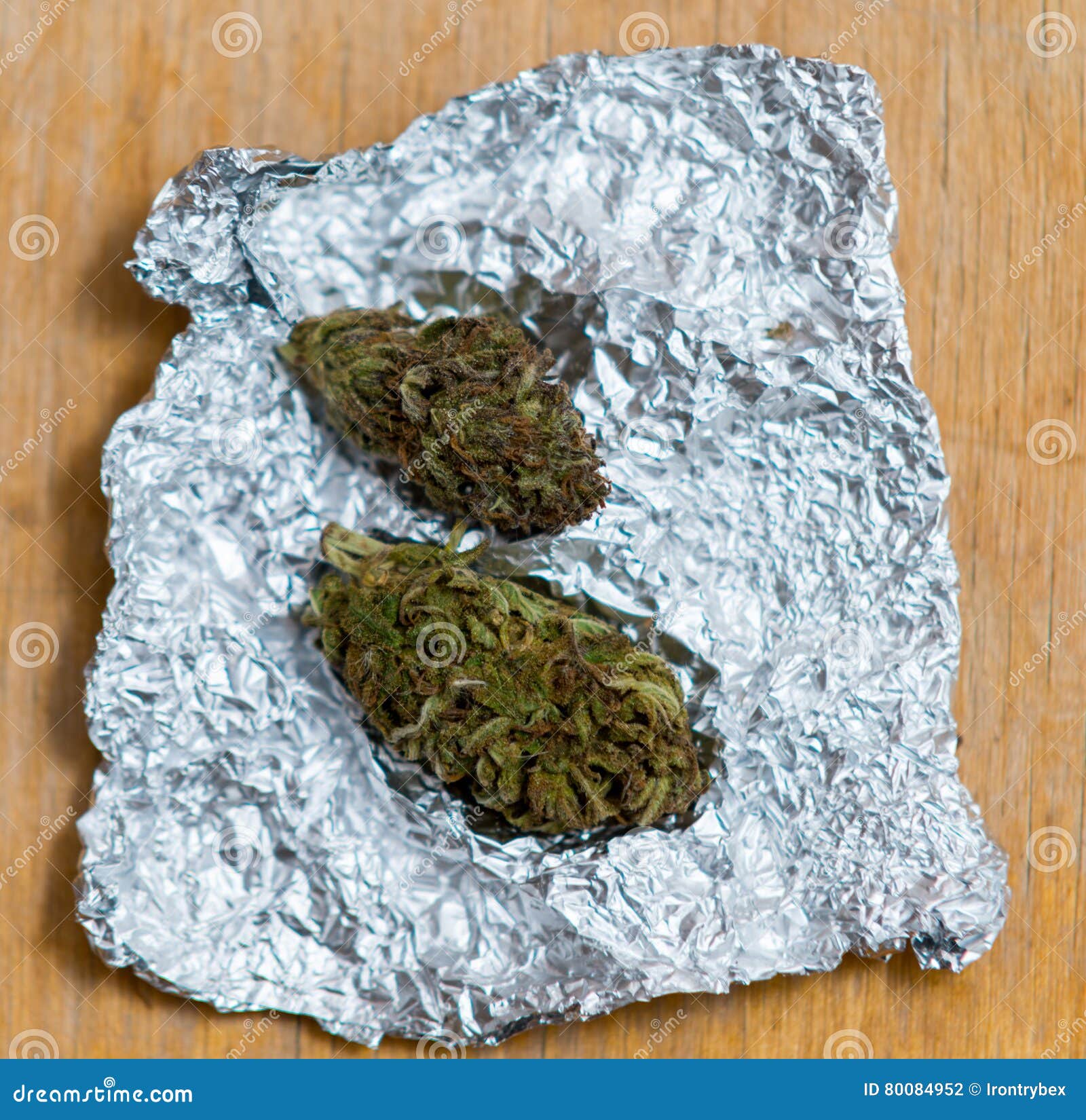 Close Up on Marijuana in Tin Foil on Table Stock Photo Image of addictive, alternative 80084952