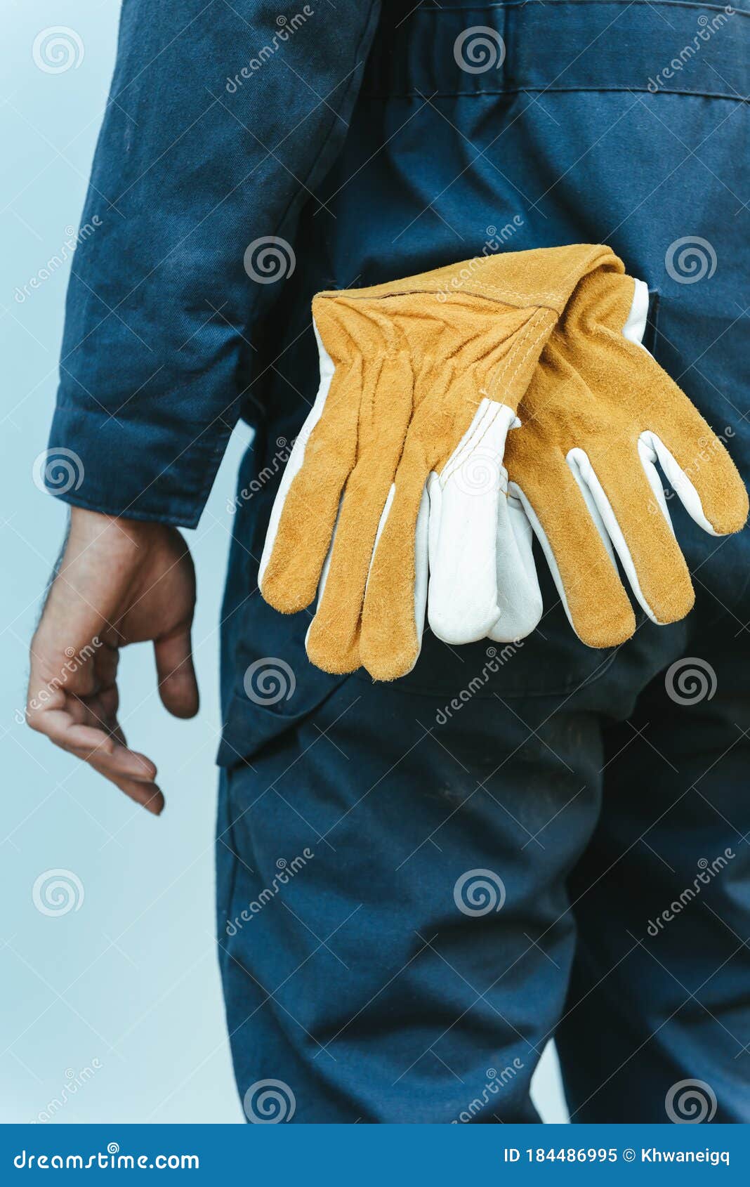 Close-Up of Mechanic Technician Hand and Leather Gloves while Standing ...
