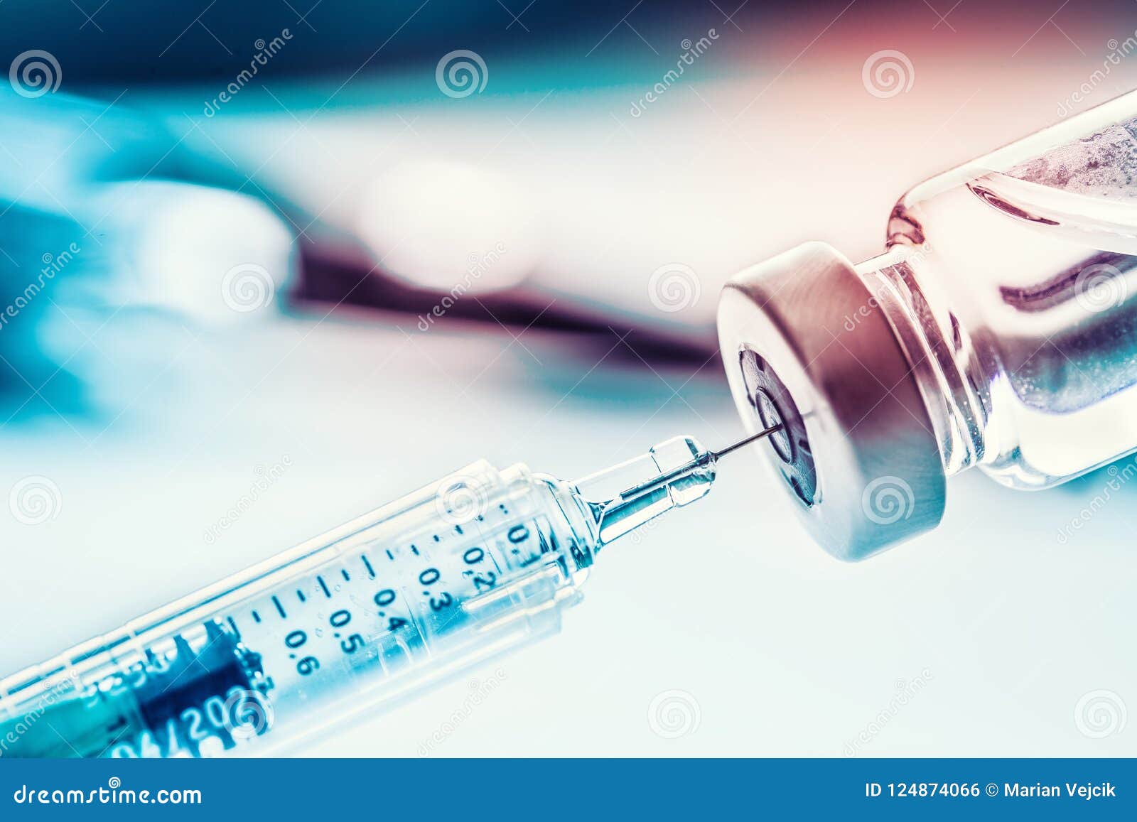 close-up medical syringe with a vaccine