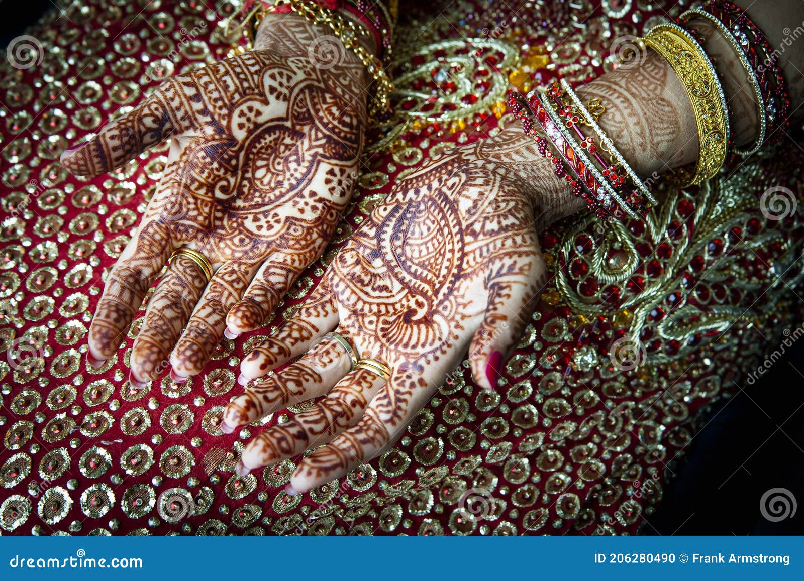 close up mehndi tattoos hands hindu sikh bride wedding dress 206280490