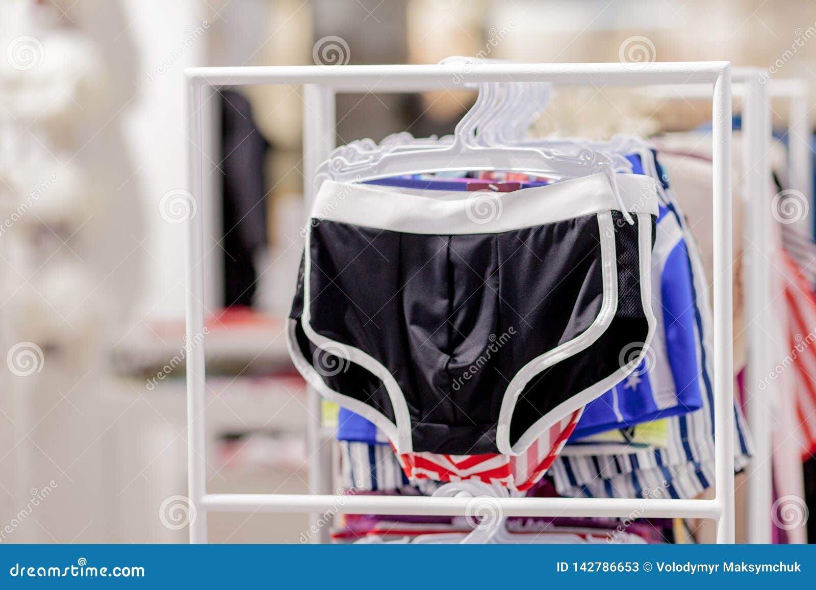 Close Up Men`s Swimming Trunks in the Store Editorial Stock Photo ...