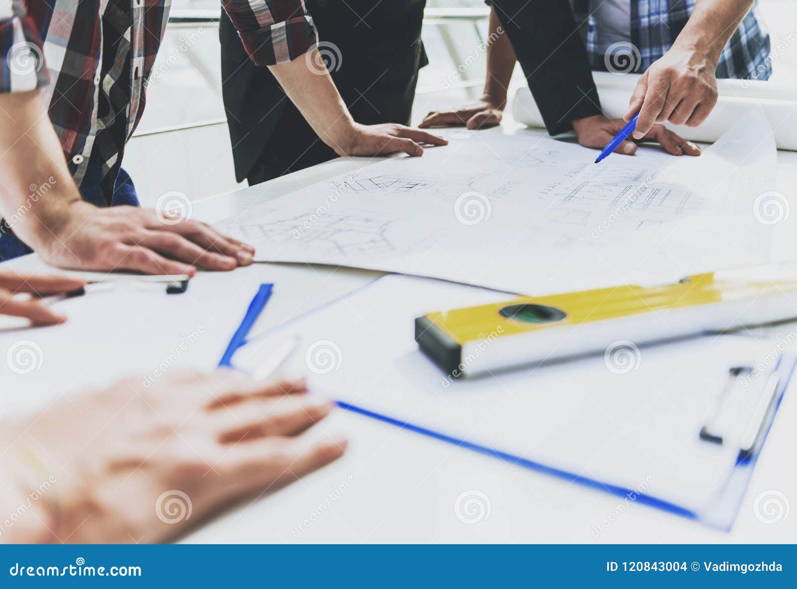 Close Up. Men Works with Blueprint and Tools. Stock Photo - Image