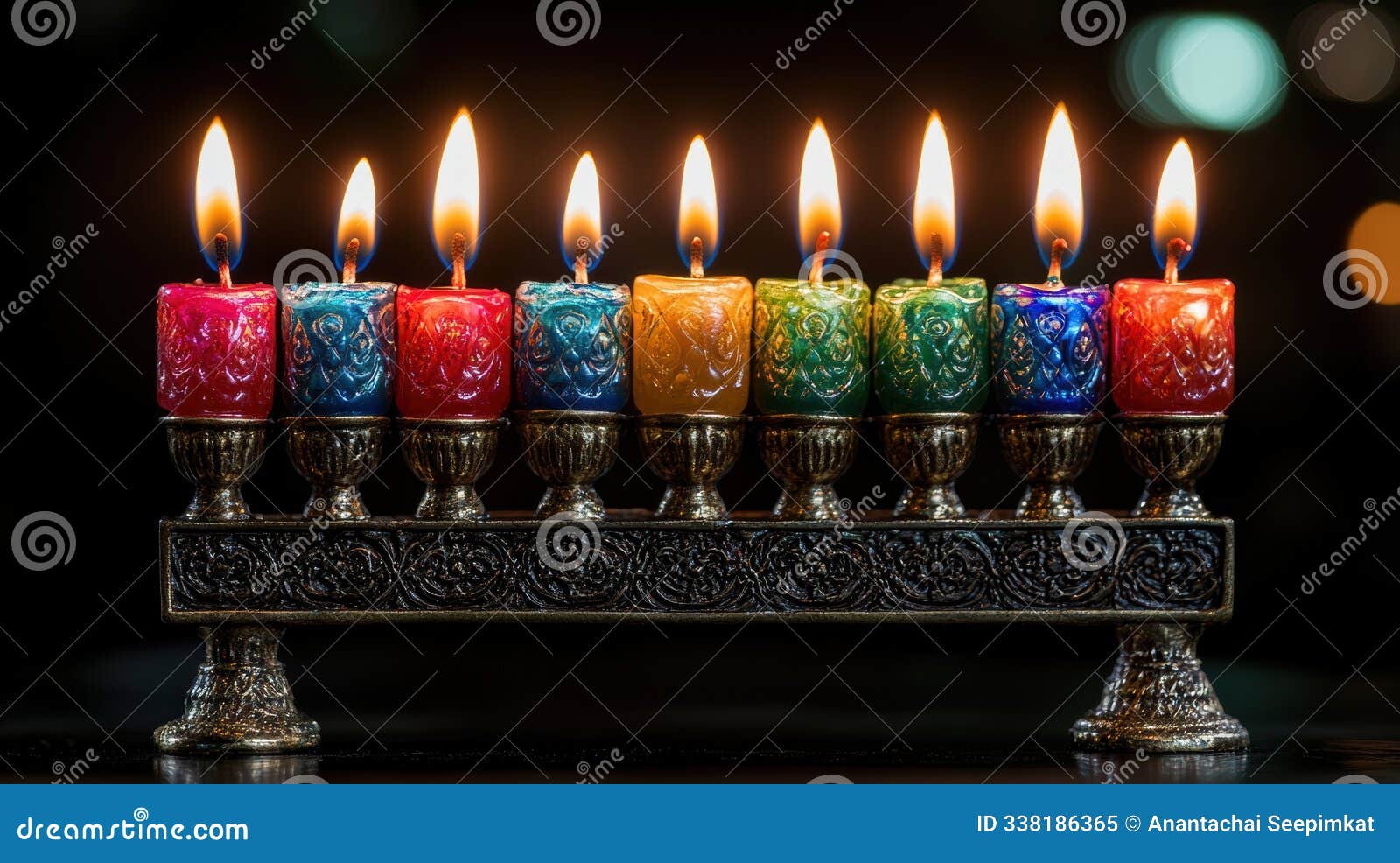 in a close-up, the menorah's brightly lit, multicolored hanukkah candles shine, reflecting the jewish festival of lights.