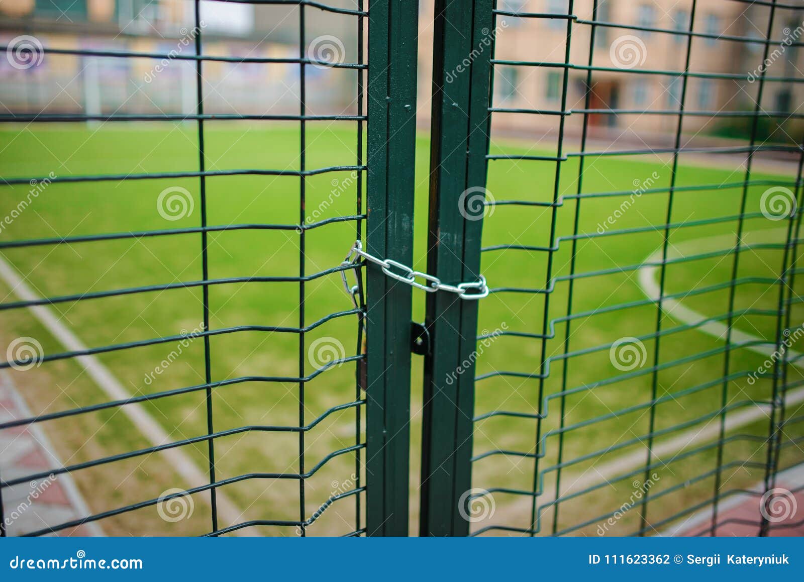 Close Up Metallic Net-shaped Green Fence That Closed And Wrapped By ...
