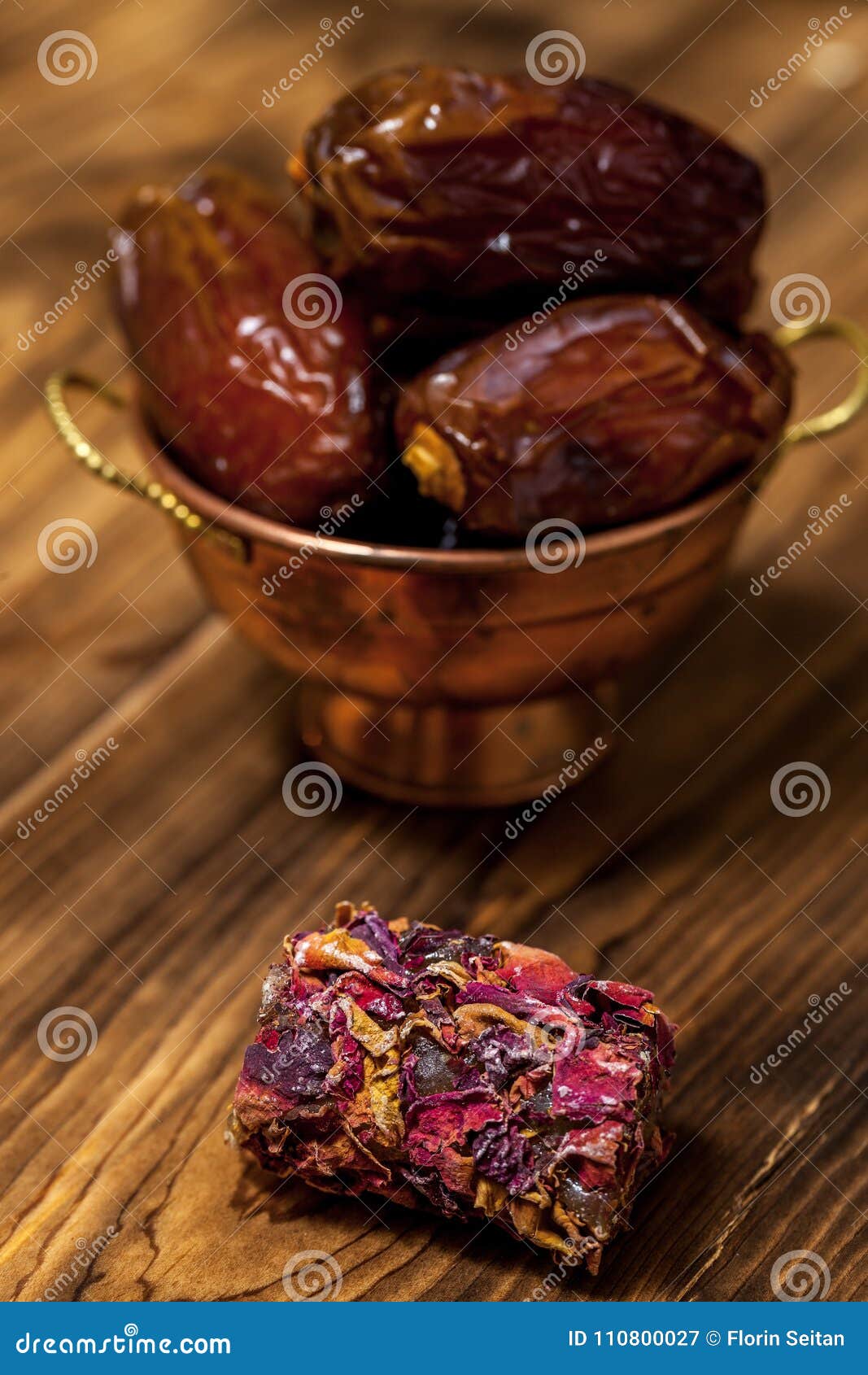 Close Up with Middle Eastern Desserts with Rose Petals and Dates in a
