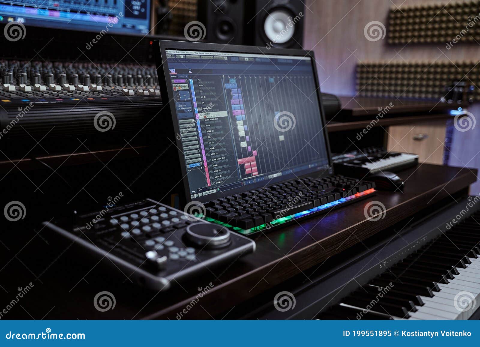 close up of midi synthesizer with screen keyboard for creating music