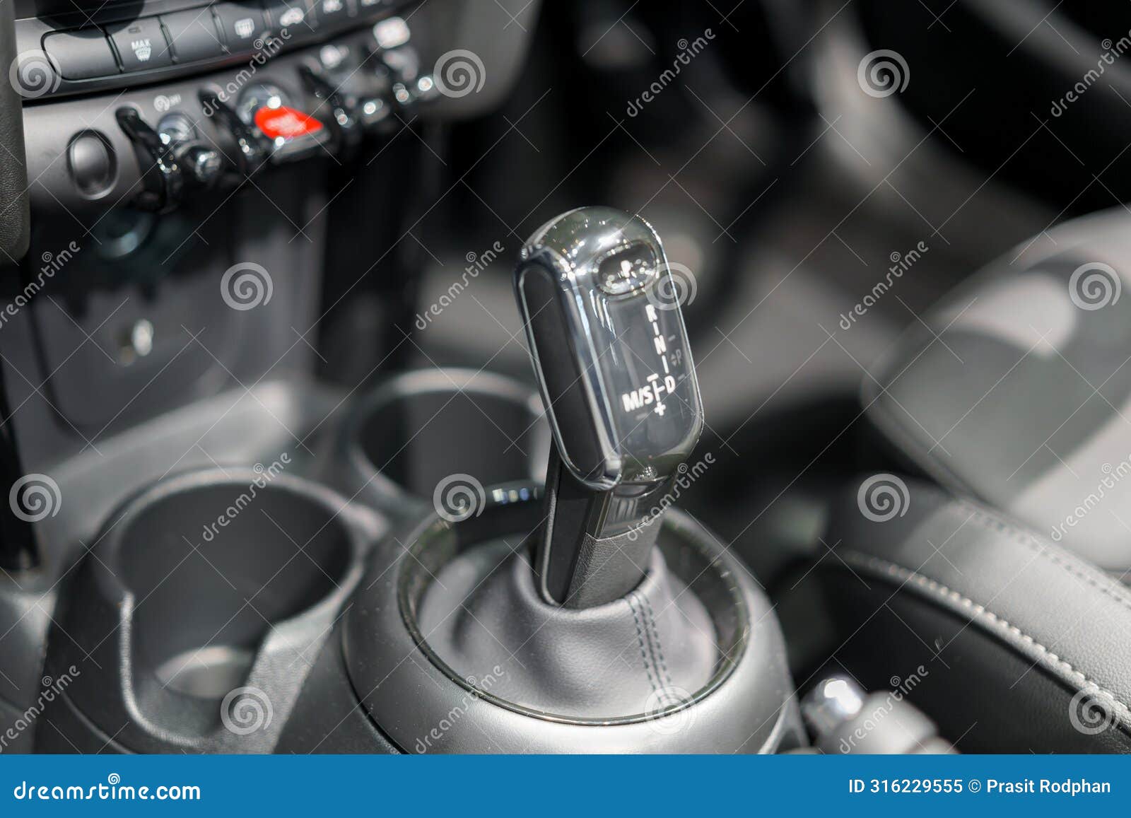 close up of modern car automatic gearbox and control buttons