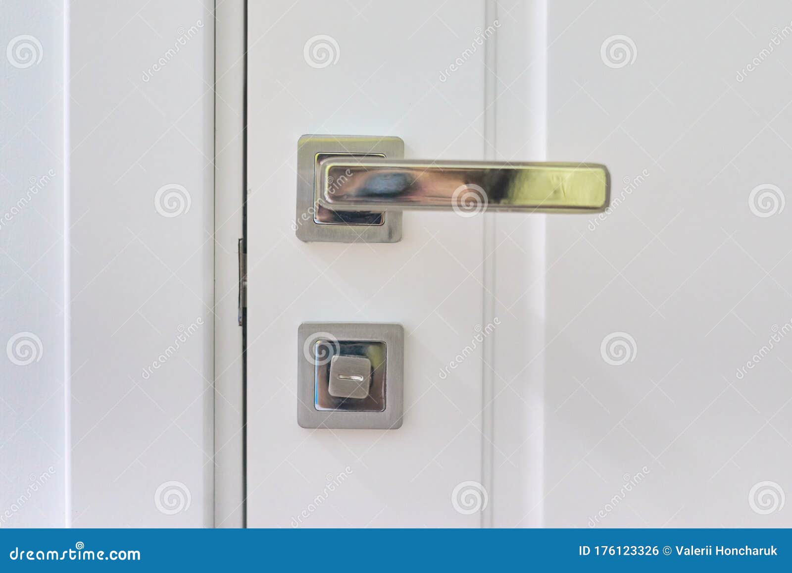 Close Up of Modern Chromed Metal Door Handle on a White Interior Door Stock Photo Image of