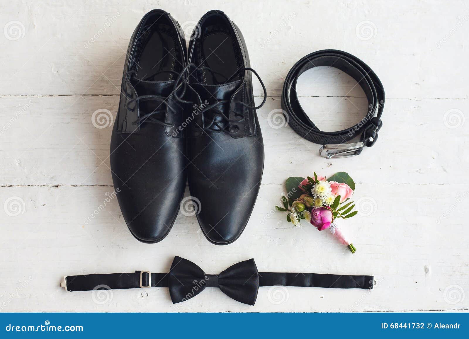 https://thumbs.dreamstime.com/z/close-up-modern-man-accessories-black-bowtie-leather-shoes-belt-flower-boutonniere-white-wood-rustic-background-set-68441732.jpg