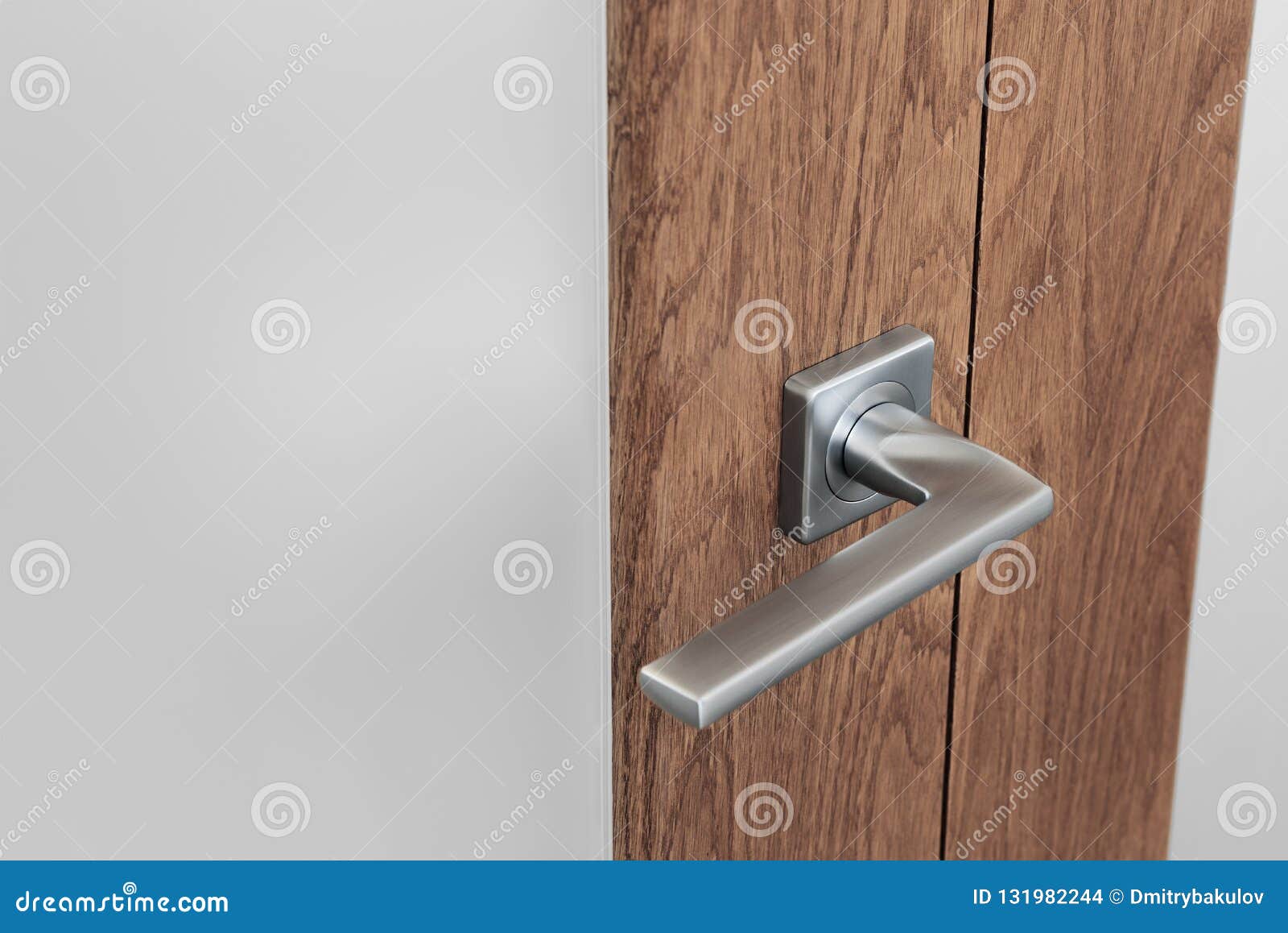 Close Up Of Modern Steel Door Handle On Interior Door Dark