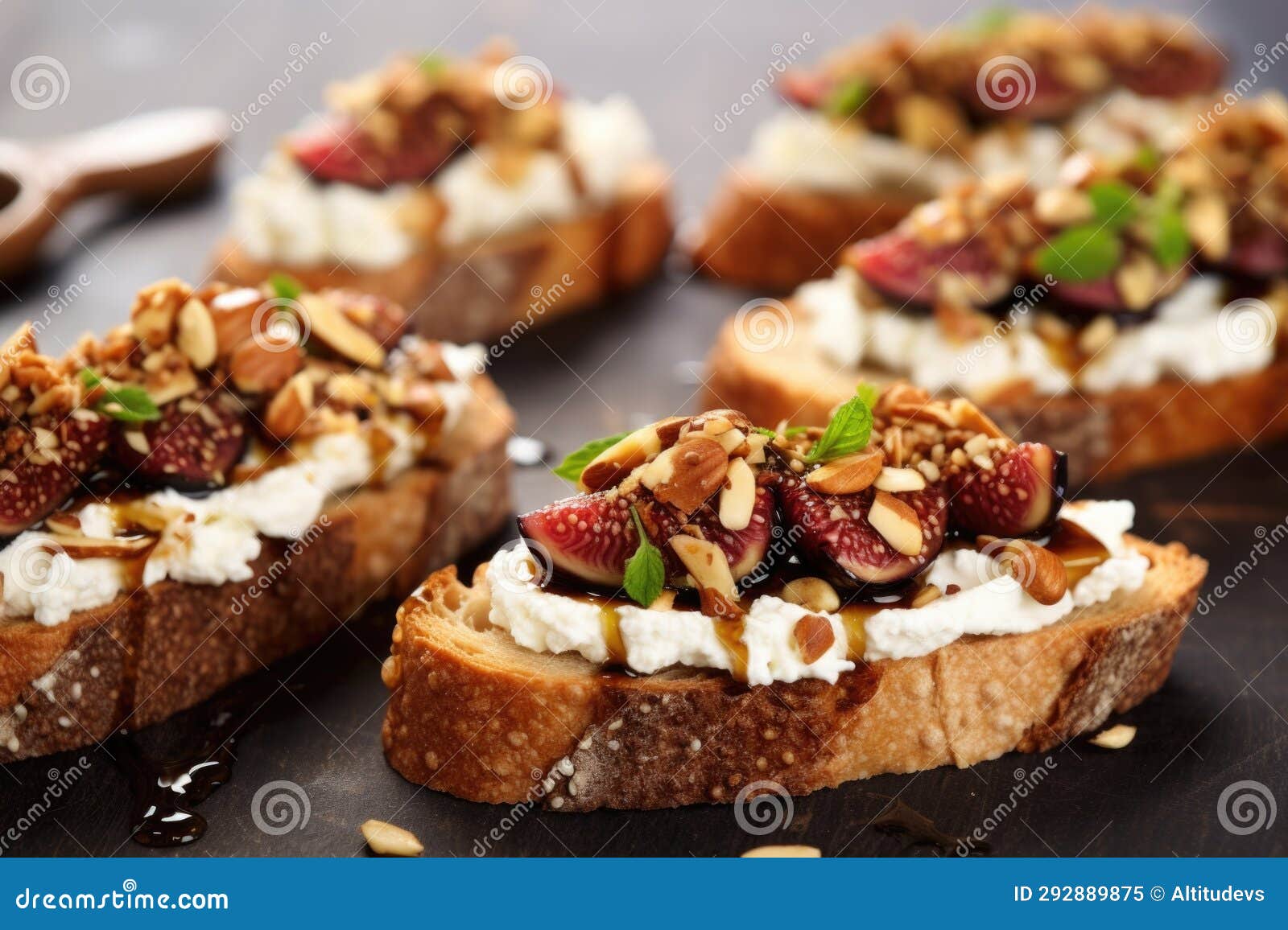Closeup of Multigrain Bruschetta with Ricotta and Fig Slices Stock