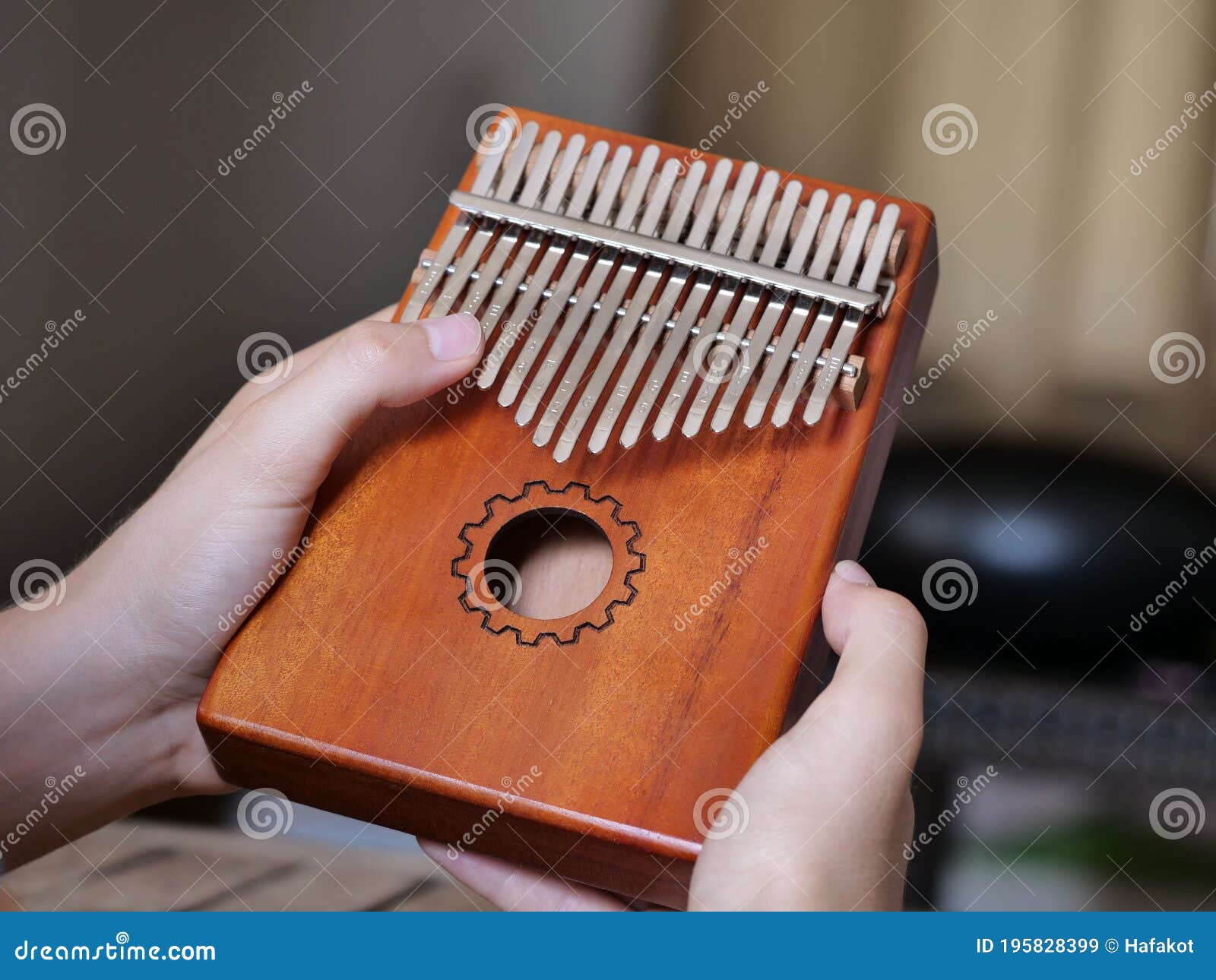 Close Up of Musician Hands Holding Kalimba Stock Image Image of
