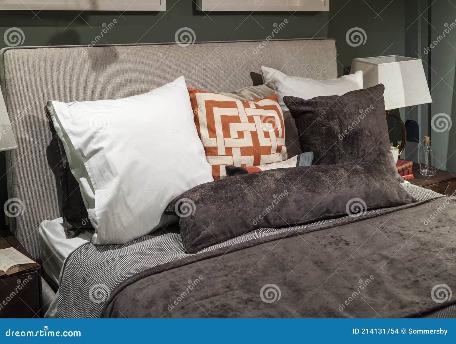 Closeup Of New Bed Comforter With Decorative Pillows Headboard In