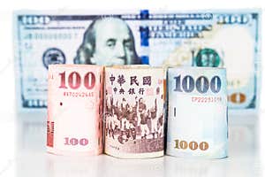 Close Up Of New Taiwan Currency Note Against US Dollar Stock Photo Close Up Of New Taiwan Currency Note Against US Dollar Stock Photo