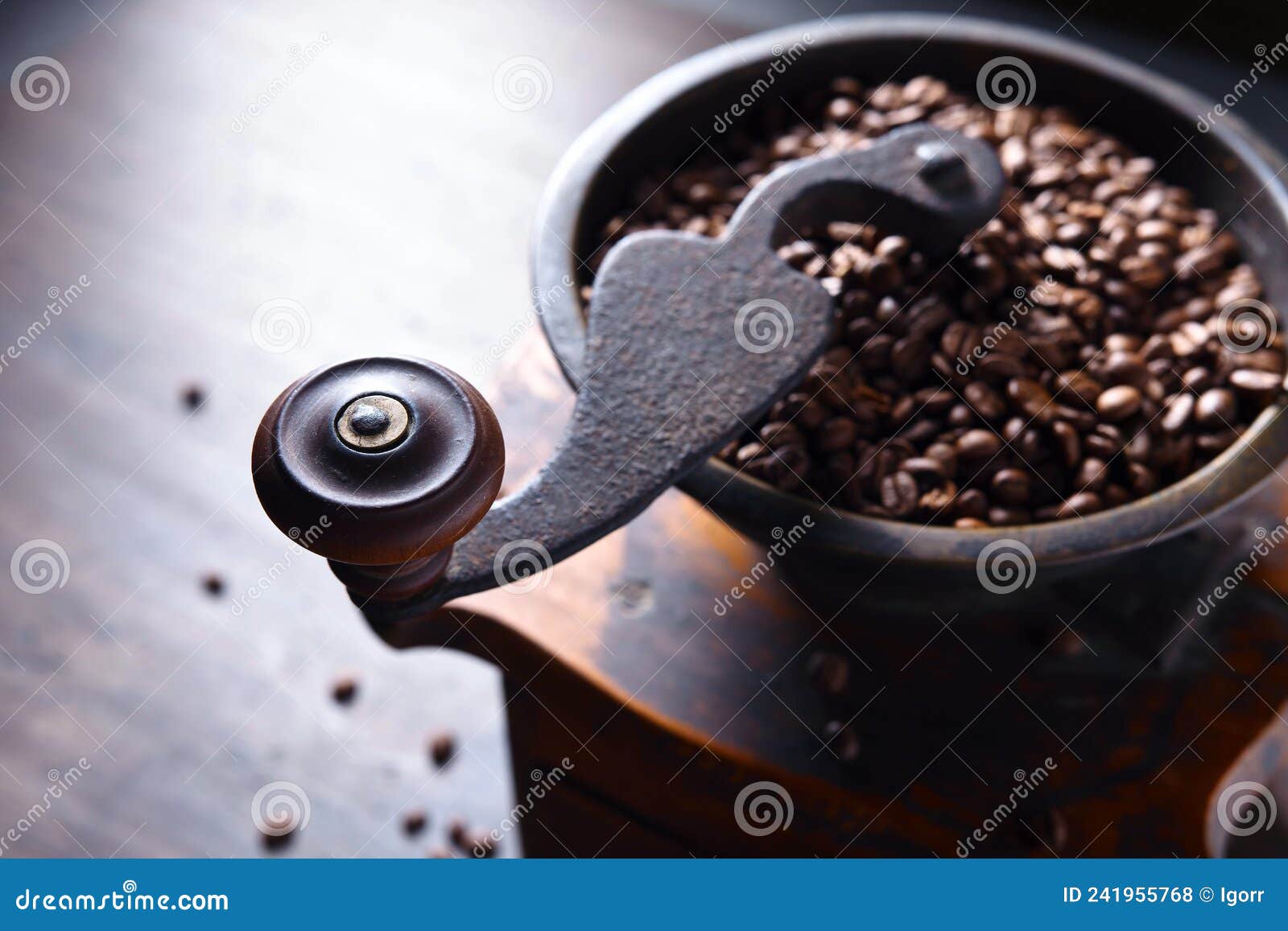 close-up of old coffee grinder and roasted coffee beans