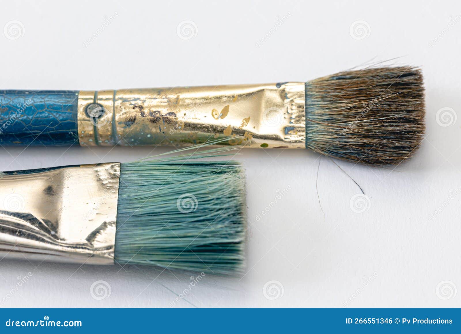 Many brushes for painting on a white background, top view. Stock Photo by  puhimec