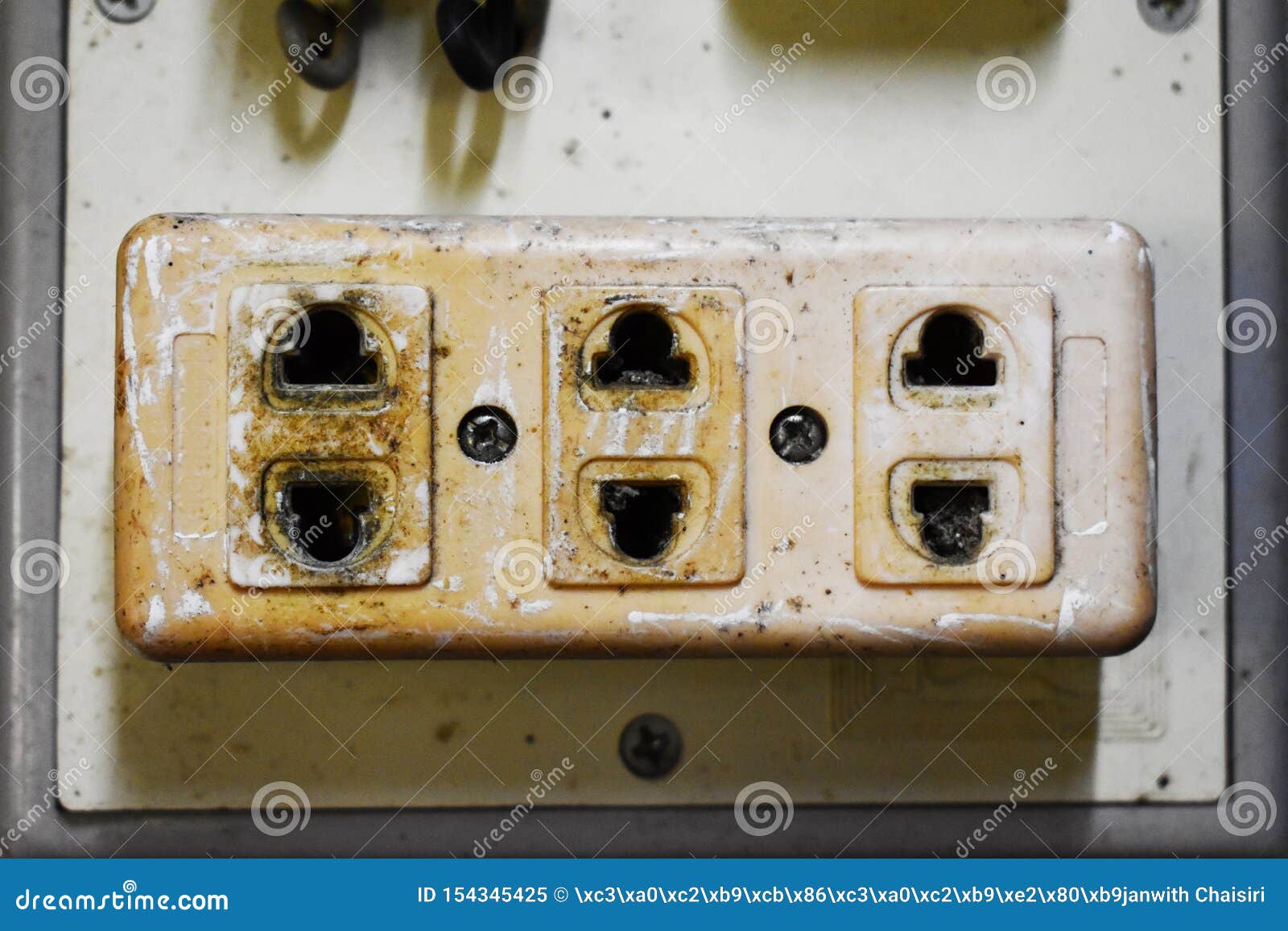 Dangerous Old Plugs on the Wall. Stock Image Image of beach