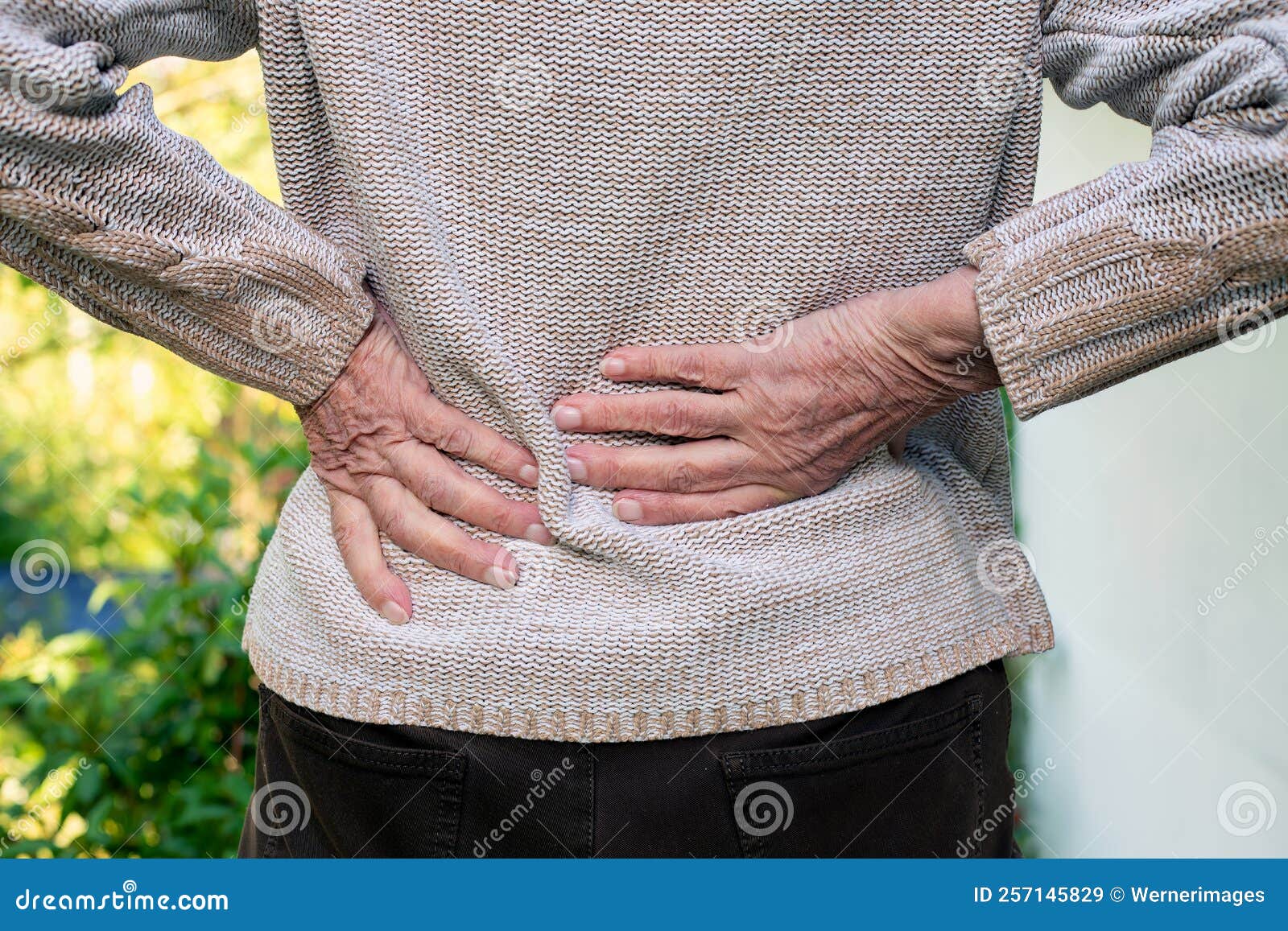 Closeup of Old Woman Rubbing Her Lower Back Stock Image Image of