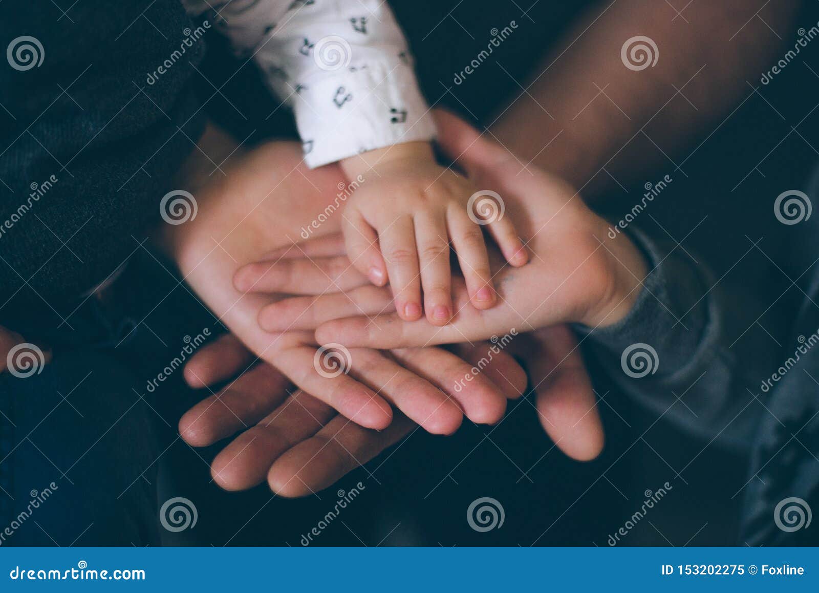 close up open hands of man and woman and kid with palm up . family together helping  harmony  and caring concept