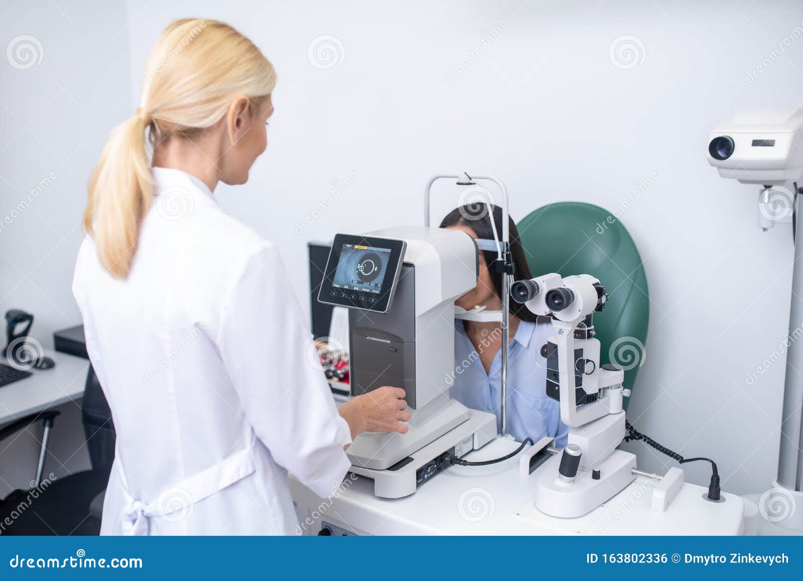 Close Up of Ophthalmologist Using Modern Equipment while Examining