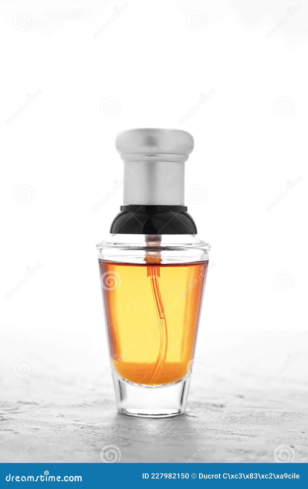 Orange perfume bottle stock photo. Image of aromatic 227982150