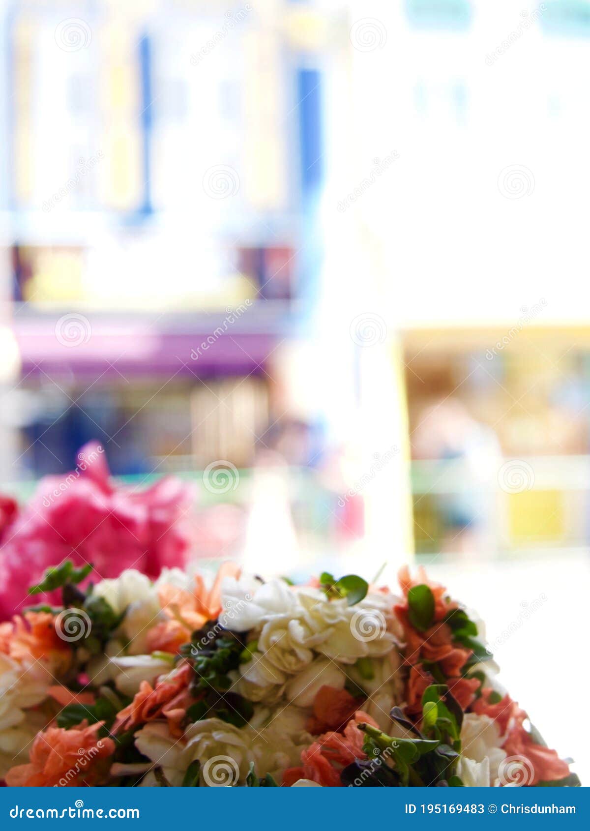 close up orange, pink and white flowers, temple offerings, singapore