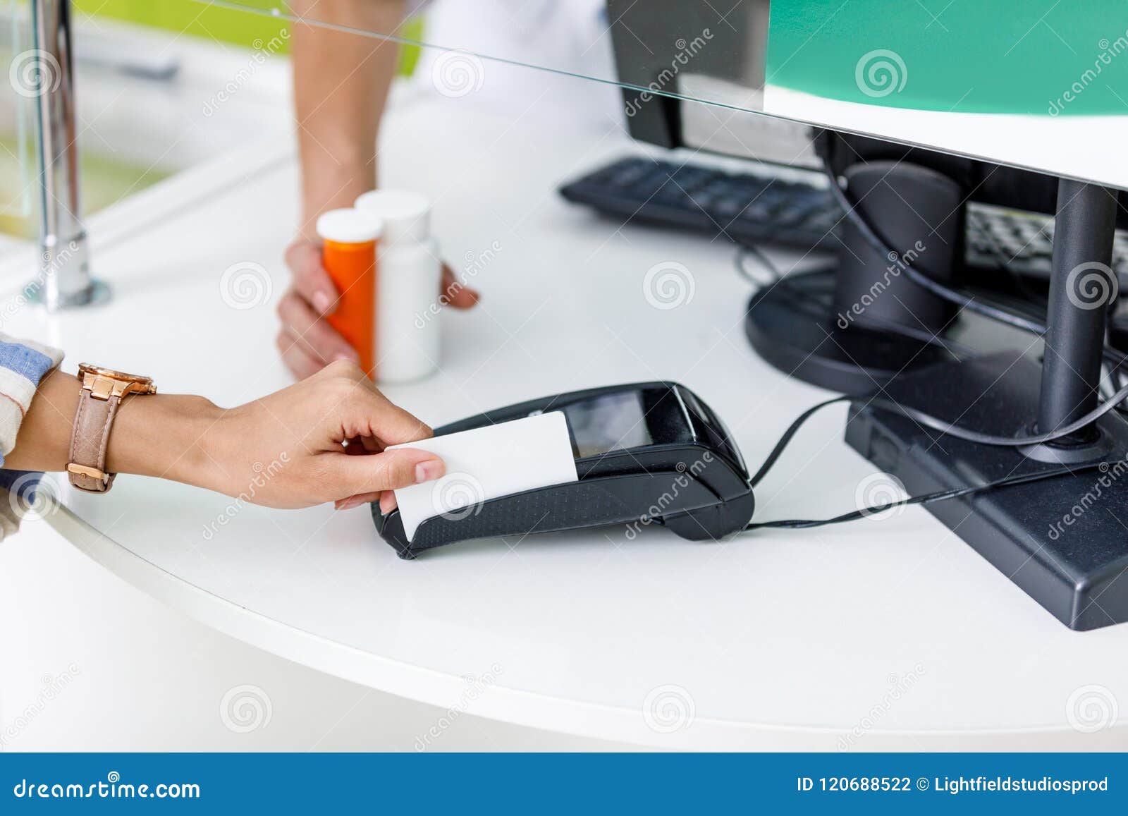 Close-up Partial View Of Customer Paying By Credit Card Stock Photo - Image of medication ...