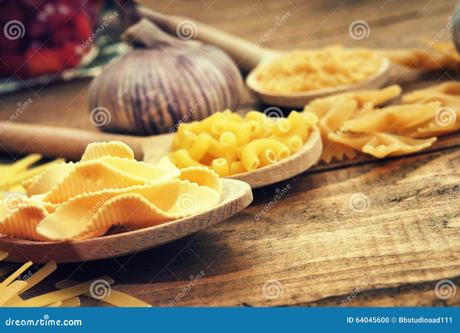 Close up of pasta on spoon stock photo. Image of uncooked 64045600
