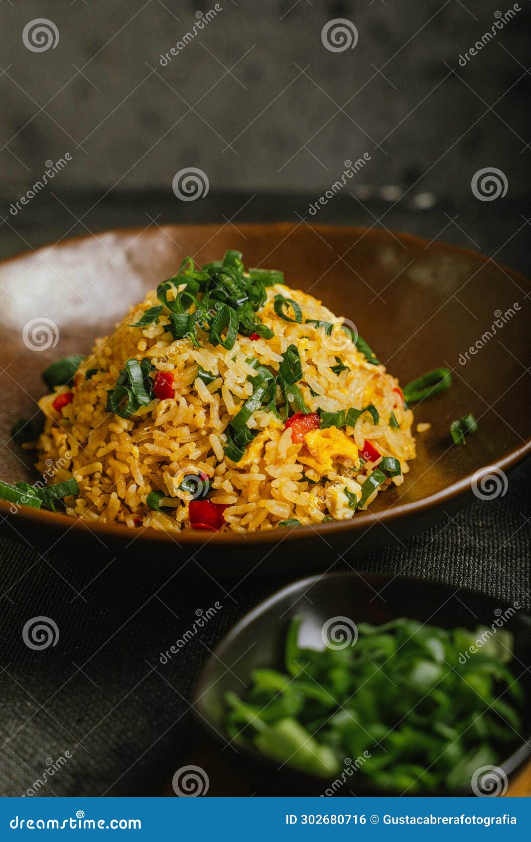 peruvian gastronomy dish called arroz chaufa .