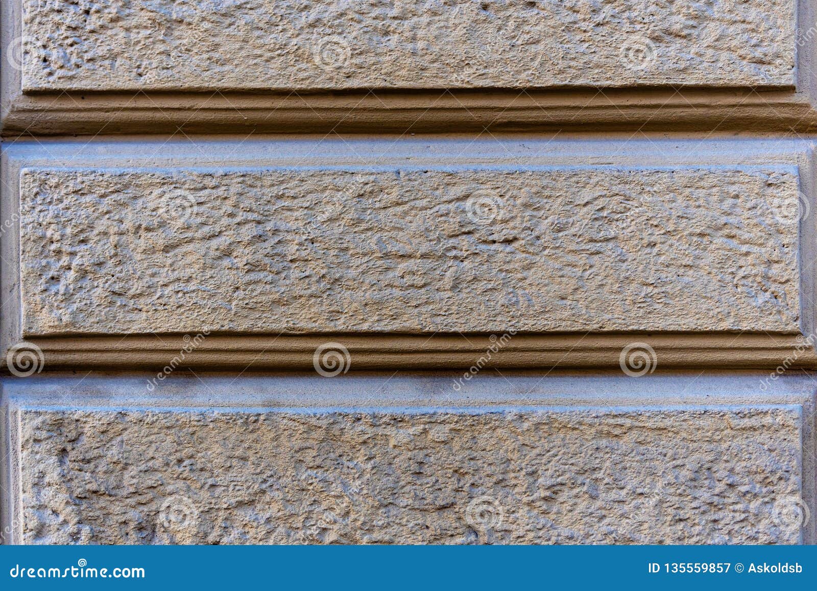 Close Up Photo Fragment Of Masonry Wall With Decorative Plaster