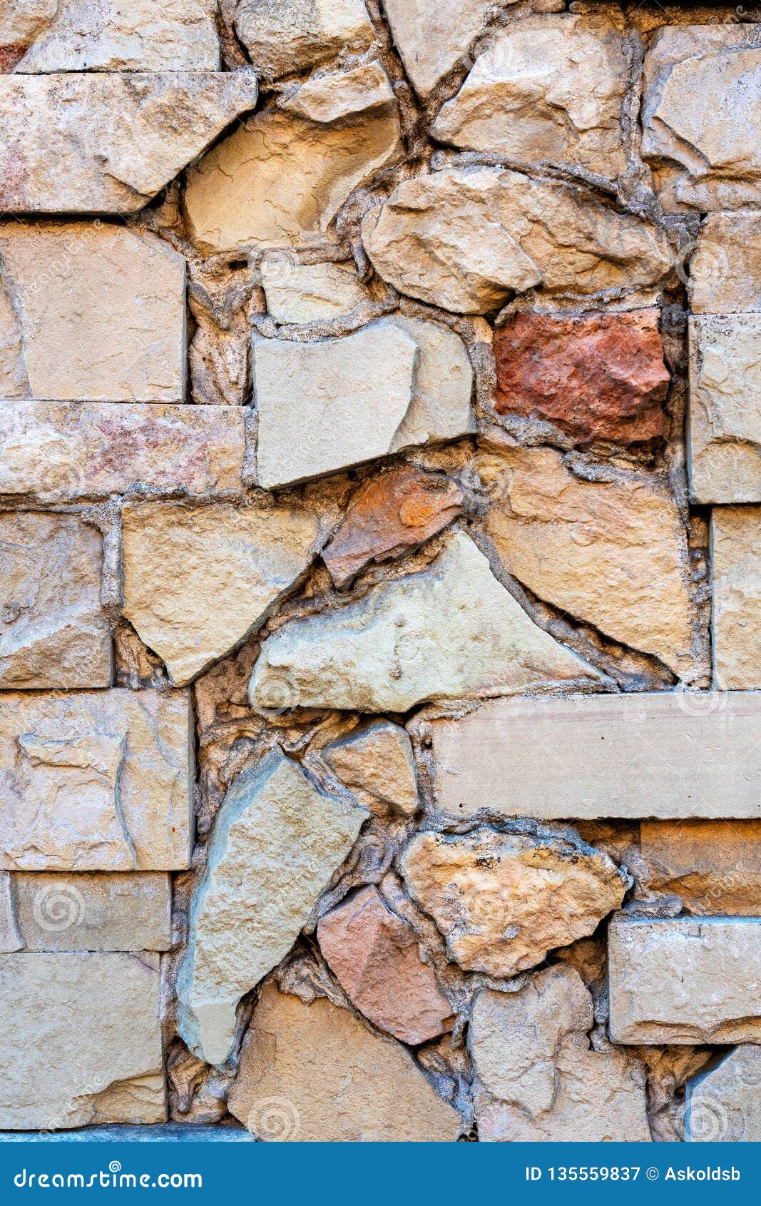 Close Up Photo Fragment Of Masonry Wall With Decorative Stone Trim