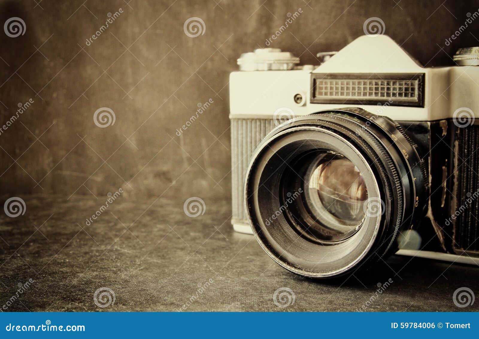 Old vintage camera closeup on wooden background Stock Photo by ©Plus69  71375685